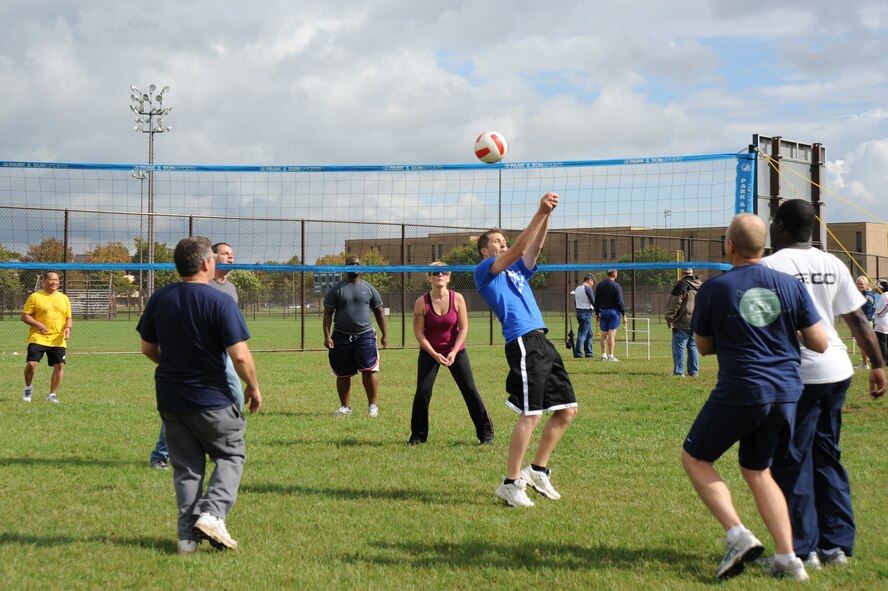 Members of Air Force District of Washington play a game of volleyball during their annual Sports Day, Oct. 14, on Joint Base Andrews, Md. AFDW servicemembers also squared-off on the field participating in dodge ball, corn hole and three-on-three basketball. (U.S. Air Force photo by Staff Sgt. Christopher Ruano)  
