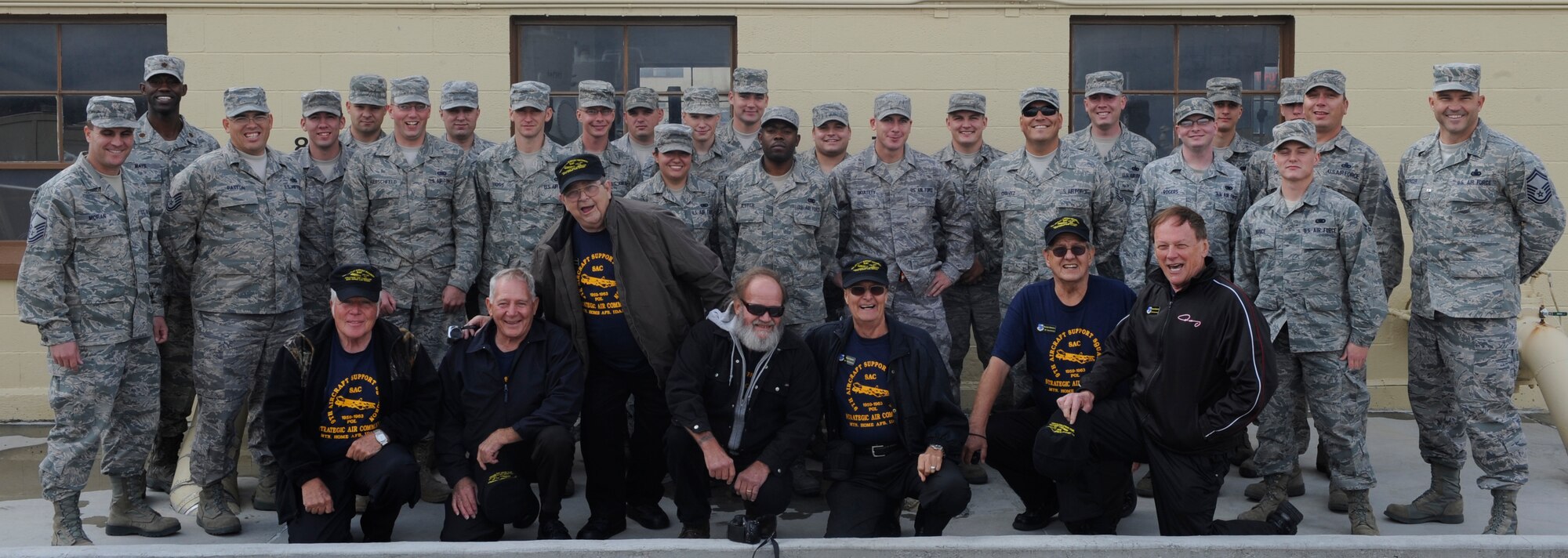 The 366th Logistics Readiness Squadron Fuels Flight celebrates the return of seven of its brothers to Mountain Home Air Force Base, Idaho Oct. 7, 2011. The men served in the same squadron and flight from 1959 to 1963, and their visit to MHAFB marks the 50th anniversary of their service. (U.S. Air Force photo by Senior Airman Angelina Drake)