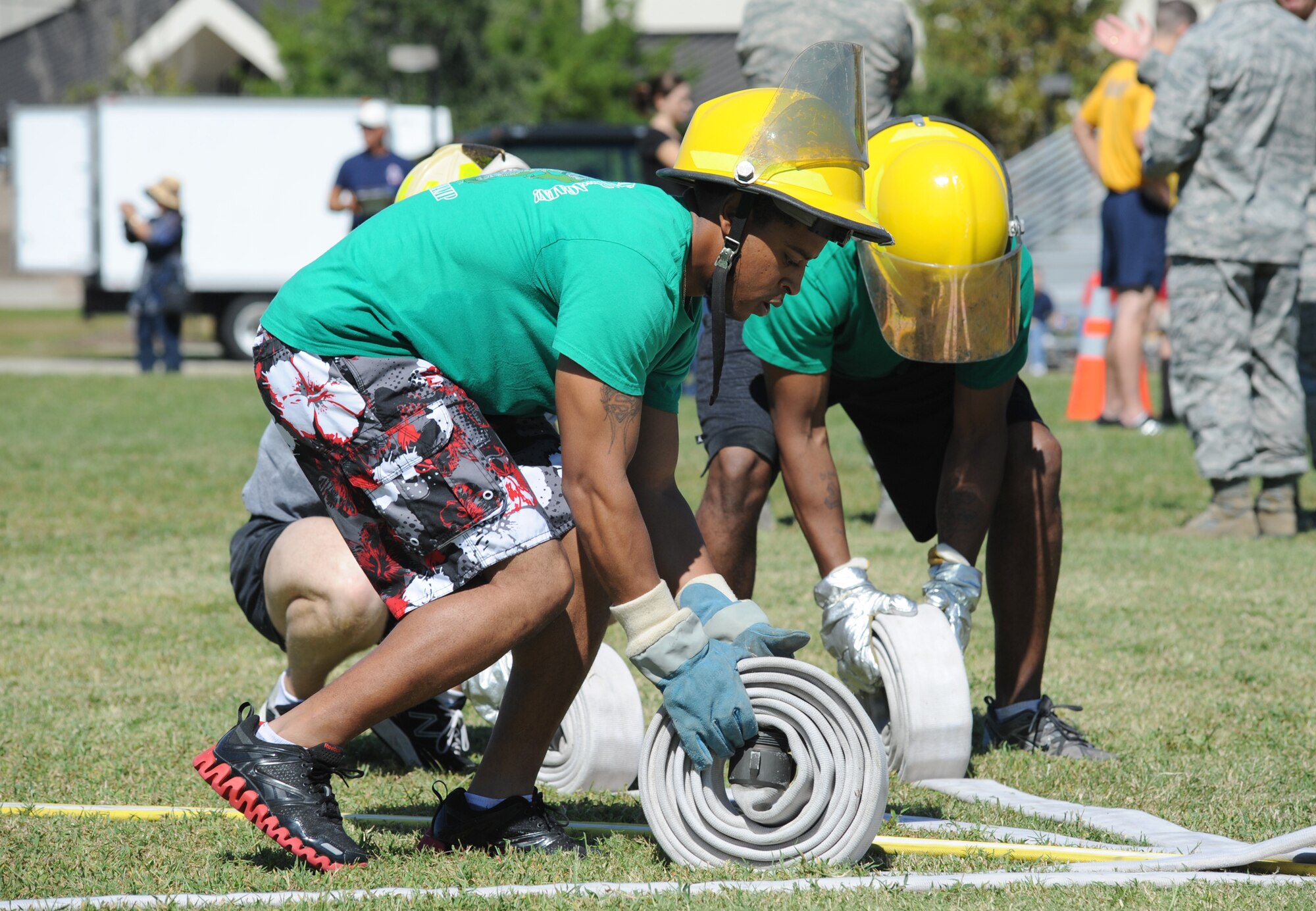 Staff Sgt. Marcus Hyatt, 334th Training Squadron military training leader, participates in the "Firefighter Challenge" at the Fire Muster Oct. 14, 2011, Keesler Air Force Base, Miss.  The Fire Muster is an event sponsored by the Keesler Fire Department in conjunction with Fire Prevention Week Oct. 11-15.  (U.S. Air Force photo by Kemberly Groue)