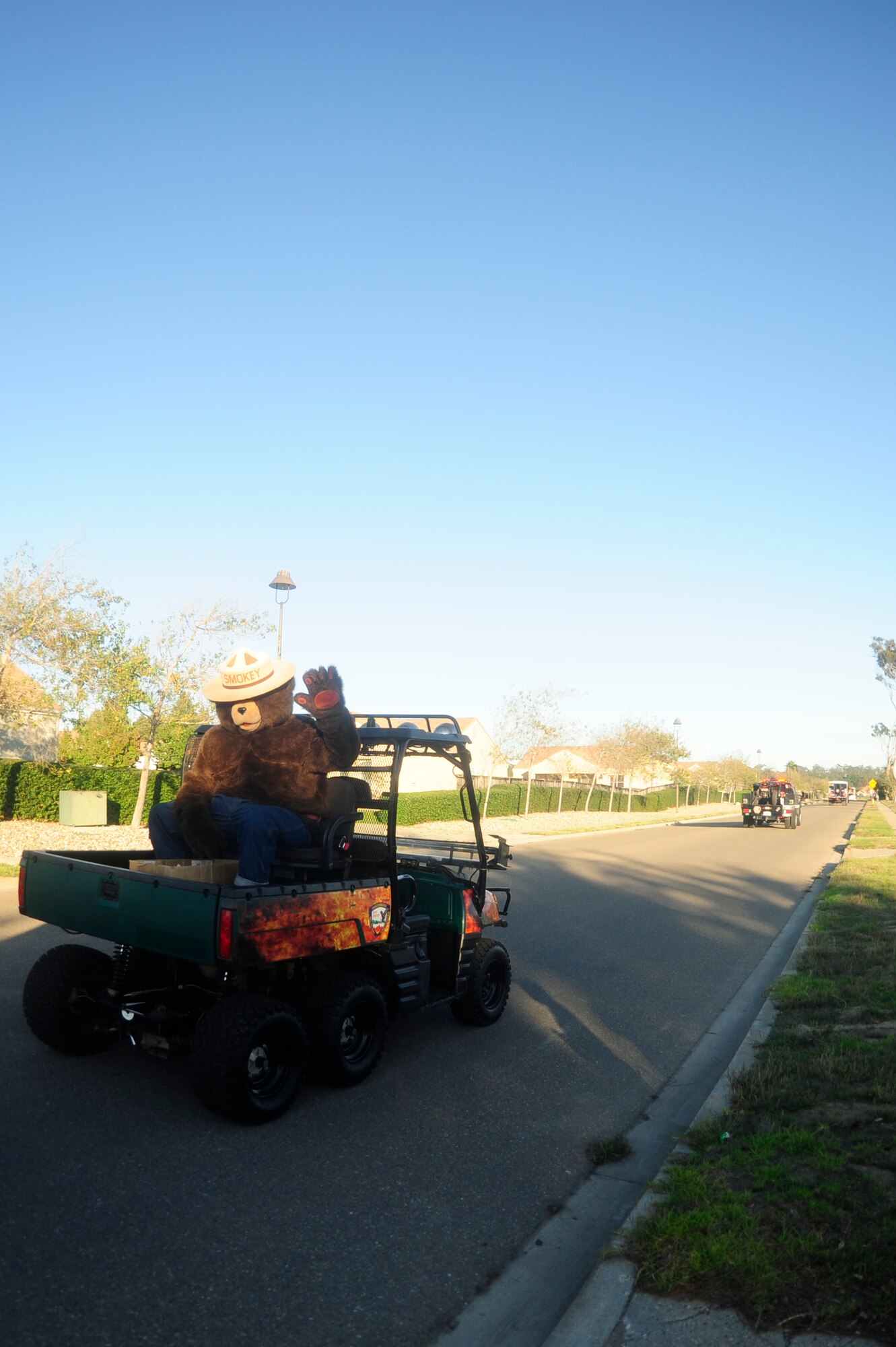 VANDENBERG AIR FORCE BASE, Calif. – Smokey the Bear waves to the camera during the Fire Prevention Week parade in base housing here Thursday, Oct. 13, 2011. The Vandenberg Fire Prevention Office held many events this week in support of National Fire Prevention Week.  (U.S. Air Force photo/Senior Airman Lael Huss)