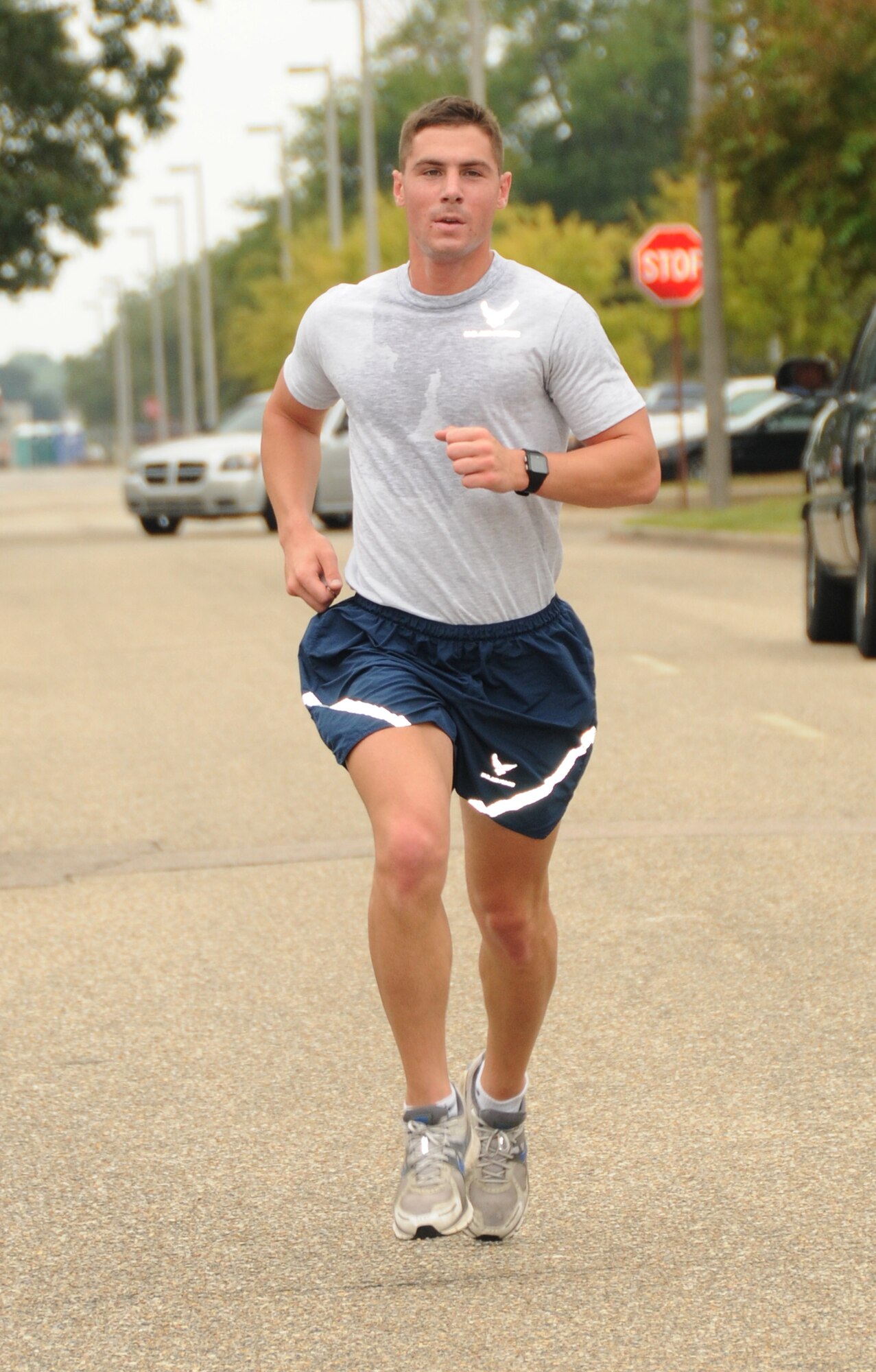 Kyle Southard, 335th Training Squadron, Keesler Air Force Base, Miss., was the first male to cross the finish line during the 5K National Breast Cancer Awareness run/walk Oct.12, 2011, with a time of 19:01. The run was sponsored by 81st Force Support Squadron and 164 people participated.  (U.S. Air Force photo by Kemberly Groue)