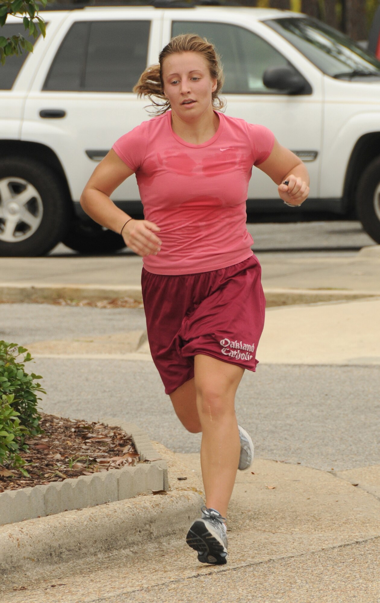 Elizabeth Levri, 335th Training Squadron, Keesler Air Force Base, Miss., was the first female to cross the finish line during the 5K National Breast Cancer Awareness run/walk Oct.12, 2011, with a time of 23:14. The run was sponsored by 81st Force Support Squadron and 164 people participated.  (U.S. Air Force photo by Kemberly Groue)