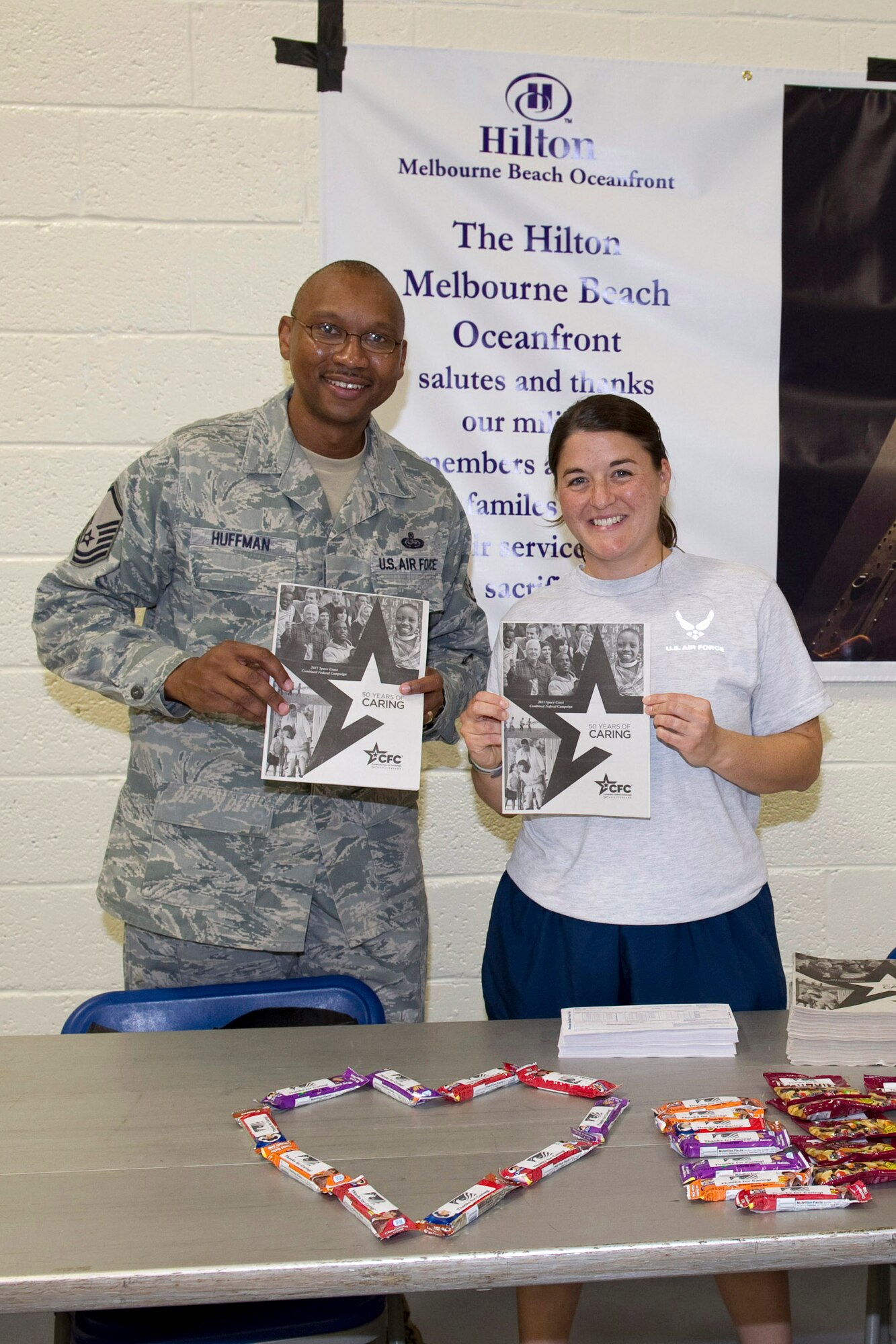 Master Sgt. Rodney Huffman, 45th Space Communications Squadron, and Maj.
Shana Figueroa, 5th Space Launch Squadron Atlas V Flight Commander, kicked
off the 2011 Combined Federal Campaign during the Sports Week picnic and
closing ceremony Oct. 7. The campaign, in its 50th year, runs through Nov.
4, and has a local goal of raising $205,000 while making 100-percent
face-to-face contact with all members eligible to donate: military
personnel, federal civilian and postal employees, and contractors. (U.S. Air Force photo/Matthew Jurgens)