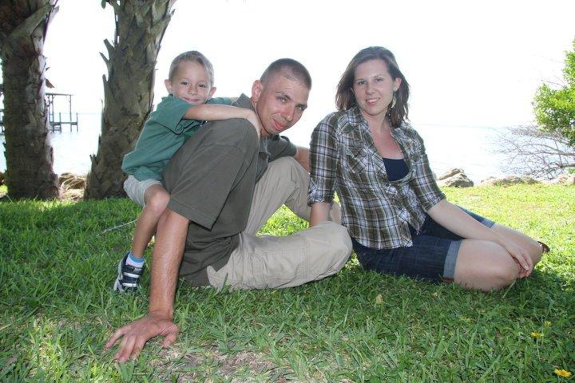 Staff Sgt. Brandon Lape, 45th Security Forces Squadron, his wife, Senior Airman Deborah Lape, 920th Rescue Wing, and their son Christian, 6. Sergeant Lape is credited with saving a man from a burning vehicle and Airman Lape cleared away onlookers just before the car exploded.