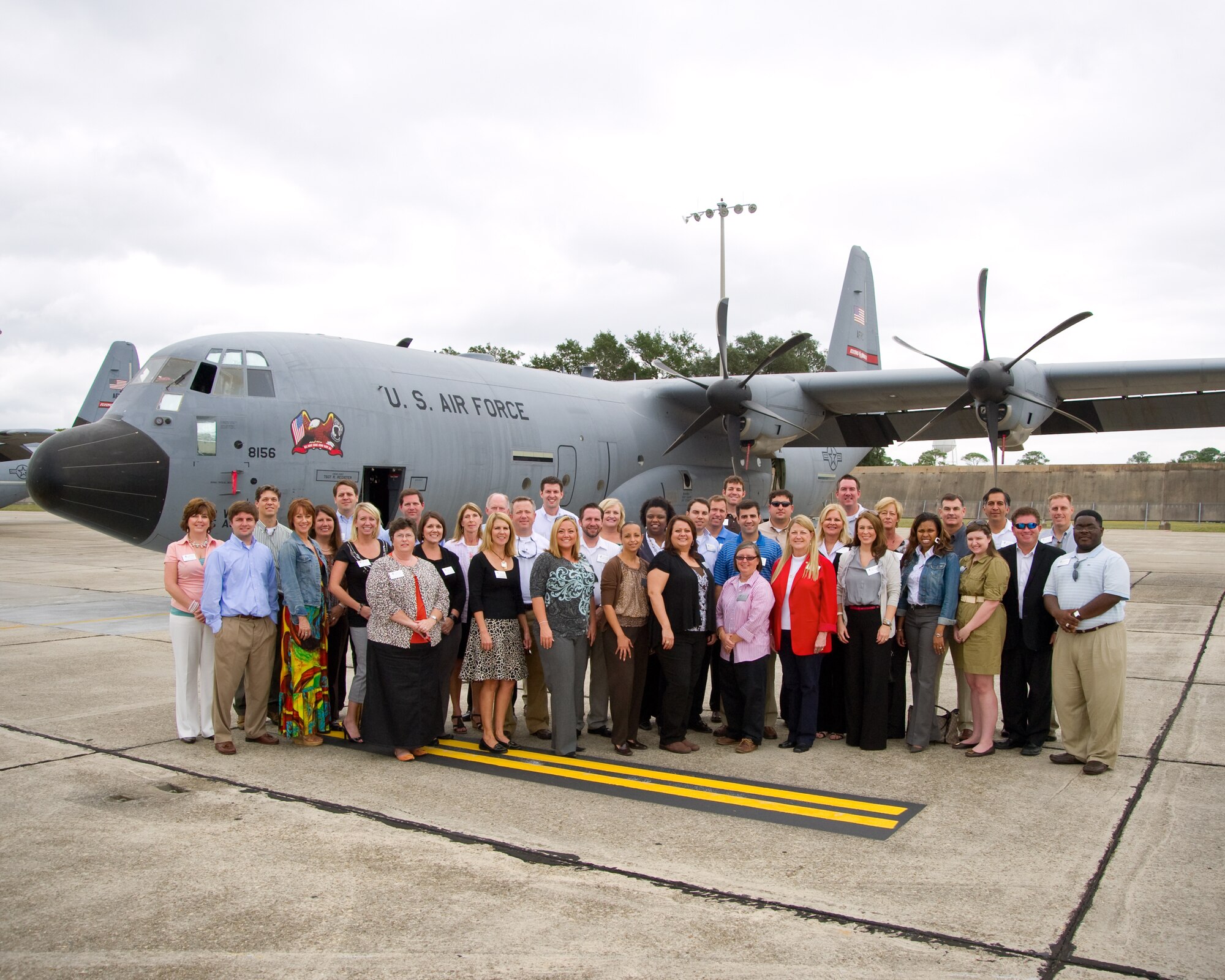 Members of Leadership Gulf Coast stand in front of a C-130J aircraft during their visit to Keesler Air Force Base, Miss., Oct. 12, 2011.  Keesler was the group's second stop and here they toured various squadrons, had a windshield tour of the base and had lunch at the Bay Breeze Event Center as part of their Military Day events.  (U.S. Air Force photo by Adam Bond)