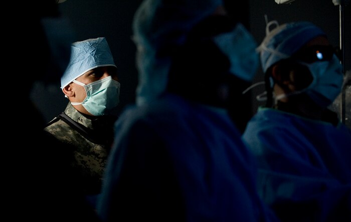 U.S. Air Force Staff Sgt. Alex Elizondo, 99th Medical Operations Squadron cardiopulmonary laboratory craftsman, observes the catheterization laboratory's first live procedure Oct. 13, 2011, at Nellis Air Force Base, Nev. The procedure is the end-all diagnostic to test for blockages in a patient's arteries and will benefit patients with severe coronary risk factors. (U.S. Air Force photo by Staff Sgt. Christopher Hubenthal/Released)

