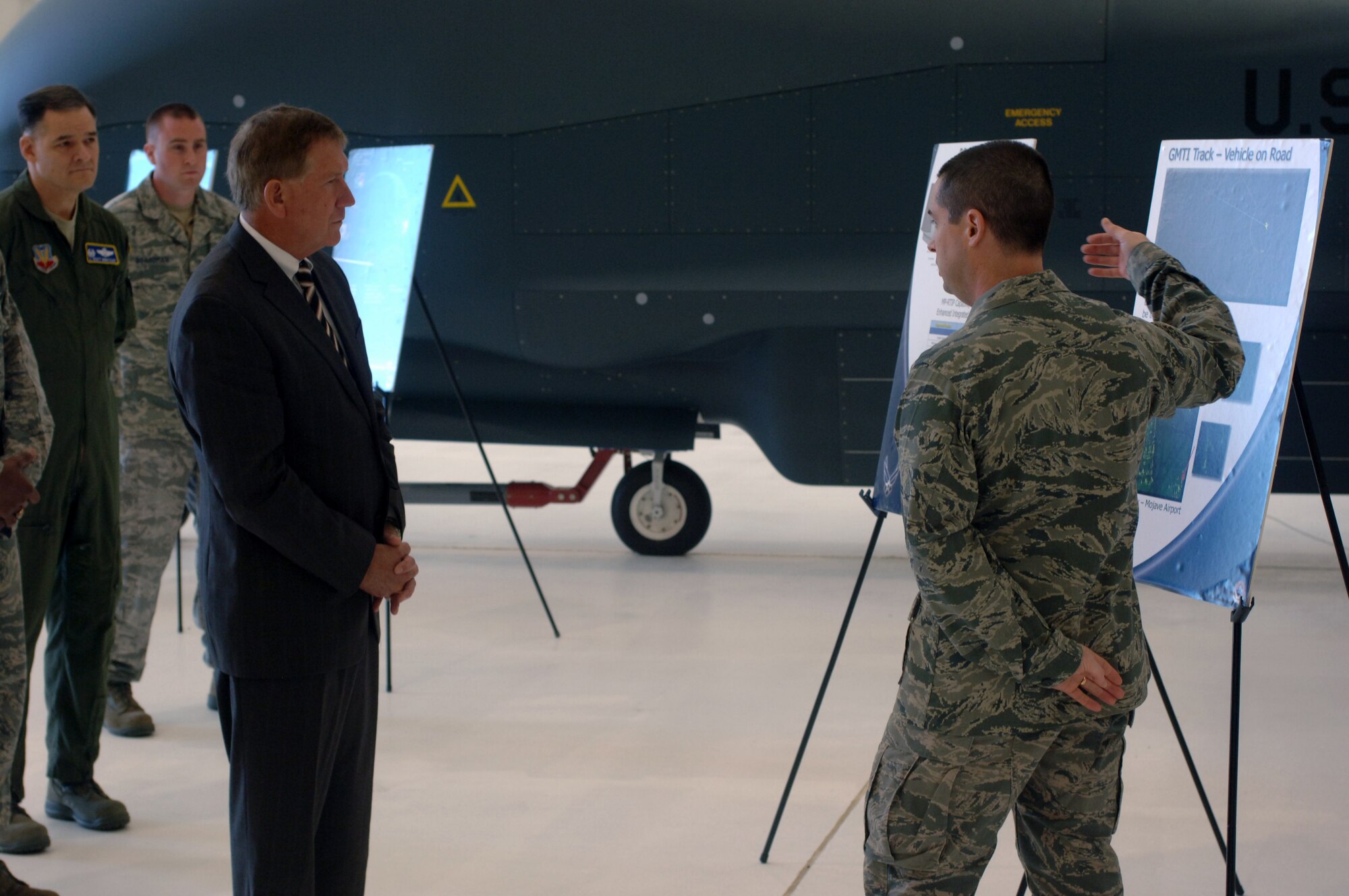 Members of the 69th Reconnaissance Group – a tenant command on Grand Forks Air Force Base, N.D. - brief Terry Yonkers, Assistant Secretary of the Air Force of Installations, Environment and Logistics, during an Oct. 13 tour. (U.S. Air Force photo/Tim Flack)