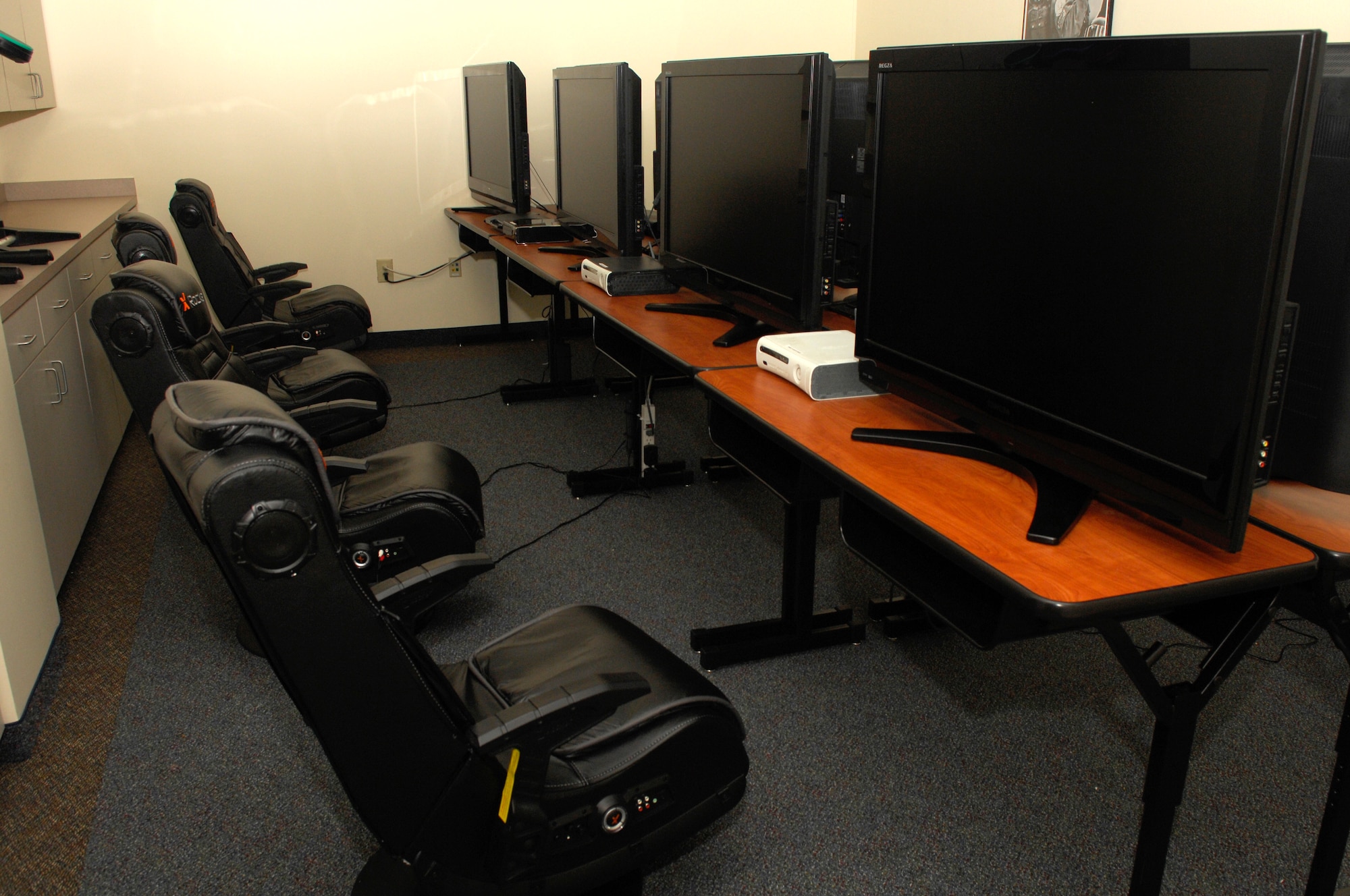 The Shaw Community Center gaming room is open for Airmen to come and enjoy an environment of gaming and fun, Shaw Air Force Base, S.C. Oct. 13, 2011. The Shaw Community Center game room has 6 Xbox systems and 2 Playstation 3 systems as well as 150 games. (U.S. Air Force photo by Airman 1st Class Ashley L. Gardner/ Released)