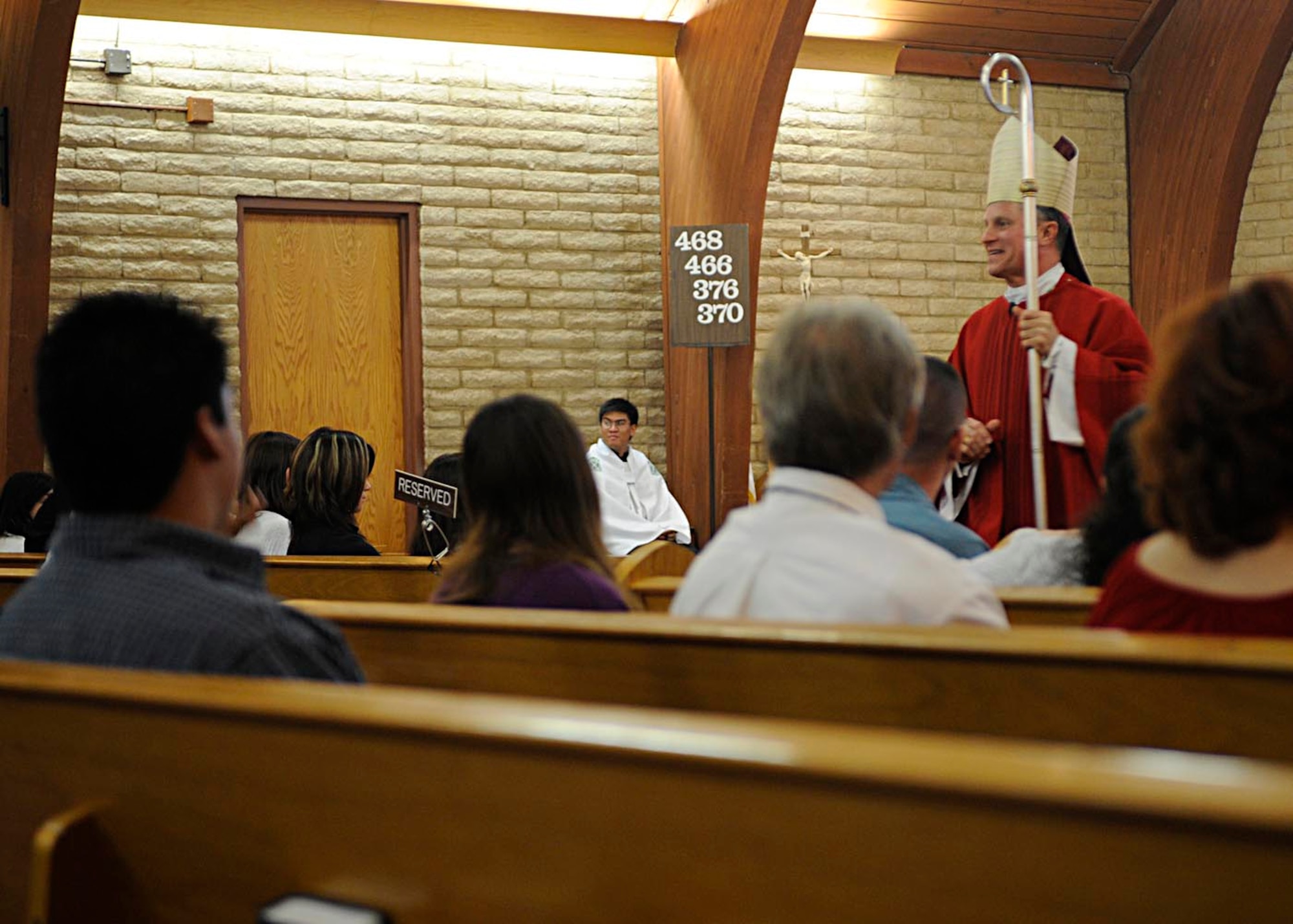 Archbishop Timothy Broglio, Archbishop for the Military Services in the
United States of America, performs a confirmation mass at the Luke Community
Chapel during his pastoral visitation of the Luke Air Force Base Catholic
Community Oct. 5. The Sacrament of Confirmation bestows the gift of the Holy
Spirit upon the person being confirmed.  (U.S. Air Force photo by Senior
Airman Ronifel Yasay)
