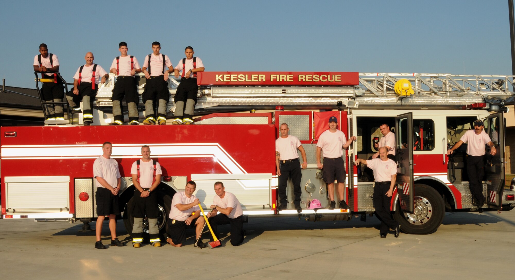 Keesler Air Force Base firefighters wear pink shirts in recognition of National Breast Cancer Awareness Month Oct. 13, 2011.  Breast Cancer Awareness month runs anually throughout October.  (U.S. Air Force photo by Kemberly Groue)