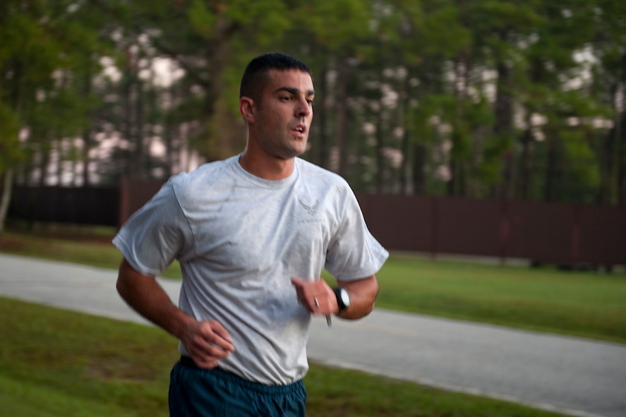 U.S. Air Force Tech. Sgt. David Edwards, 820th Combat Operations Squadron, completes a one-mile run during the annual LeeBernard Chavis Memorial Workout Oct. 14, 2011, at Moody Air Force Base, Ga. The workout is a tribute to Airman 1st Class LeeBernard Chavis and takes place annually on the anniversary of his death. Chavis was a turret gunner while deployed to Baghdad, Iraq, and was killed by an enemy sniper. (U.S. Air Force photo by Staff Sgt. Jamal D. Sutter/Released) 