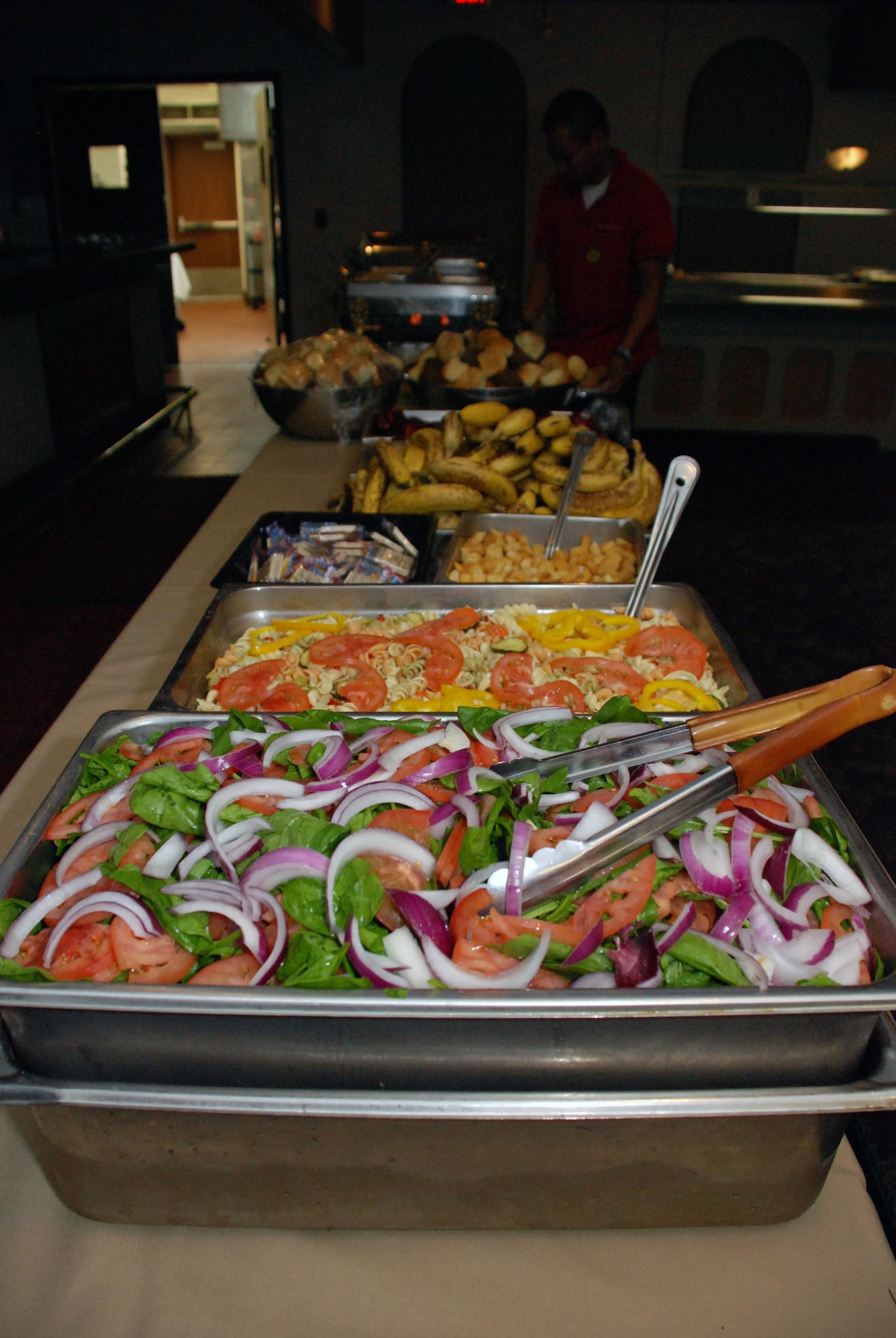 The unit training assembly troop feeding line stands ready to open for lunch on Sept. 11, 2011, at the Hap Arnold Club at March Air Reserve Base, Calif. One of the focuses of a year-long nutrition project at the base is an increase in the serving and consumption of fresh fruits and vegetables.  (U.S. Air Force photo/Senior Airman Patrick Cabellon)