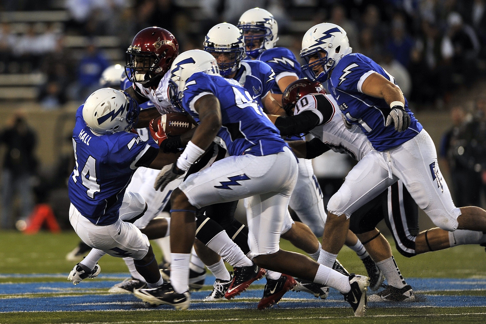 Air Force defensive back Josh Hall leads a tackle during the Falcons' match against San Diego State at Falcon Stadium Oct. 13, 2011. Hall had eight tackles, including five solo tackles, in the Falcons' 41-27 defeat. (U.S. Air Force photo/Bill Evans)
