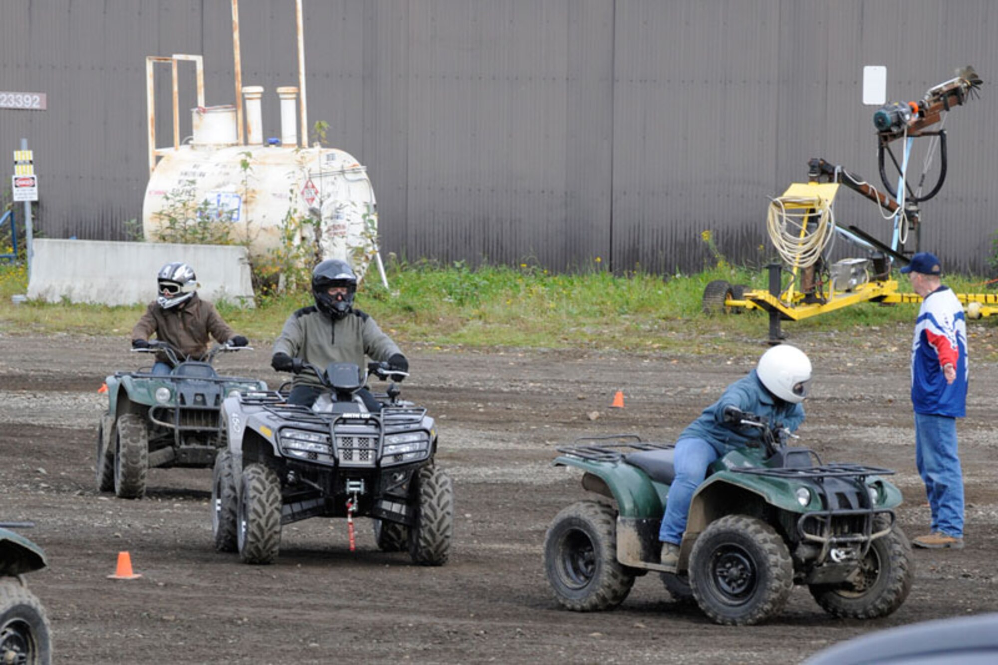 An instructor-in-training watches his class as they demonstrate proper riding techniques.  (U.S. Air Force photo/Steven White)