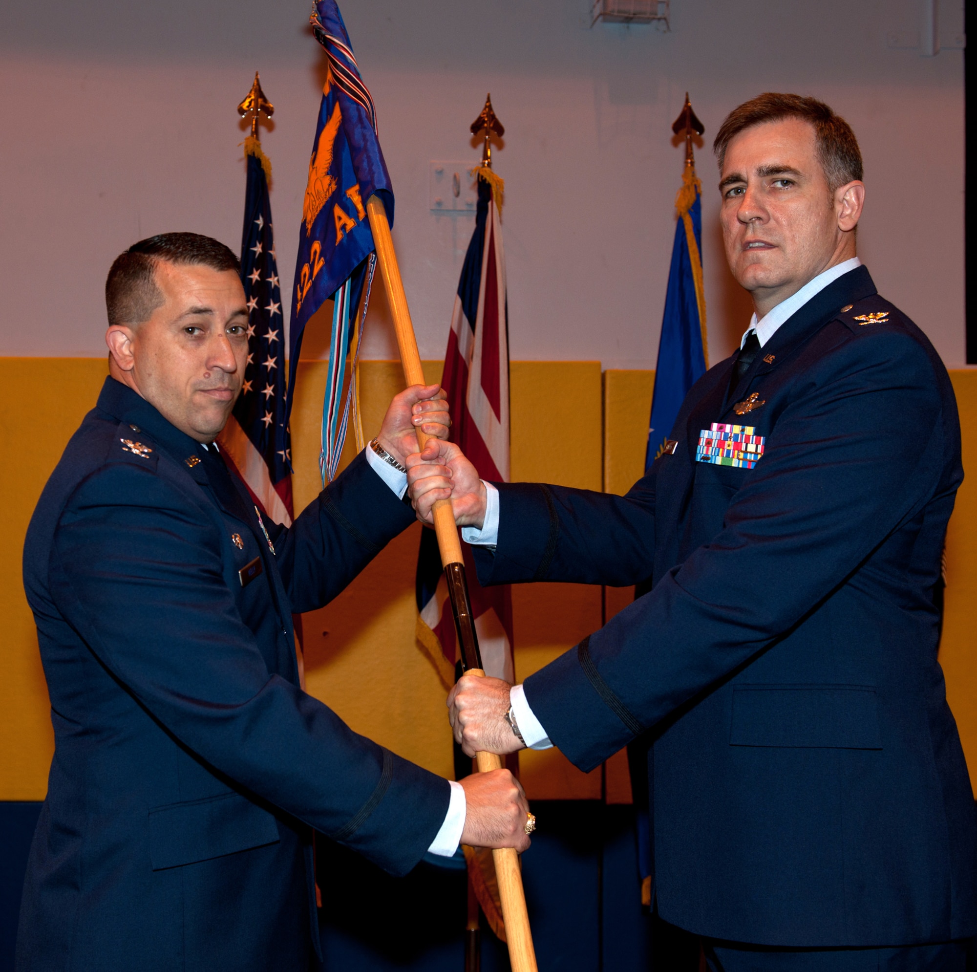 RAF CROUGHTON, United Kingdom - Col. Brian Kelly, 501st Combat Support Wing commander, gives command of the 422nd Air Base Group to Col. Charles Hamilton here Oct. 14. (U.S. Air Force photo by Tech. Sgt. John Barton) 