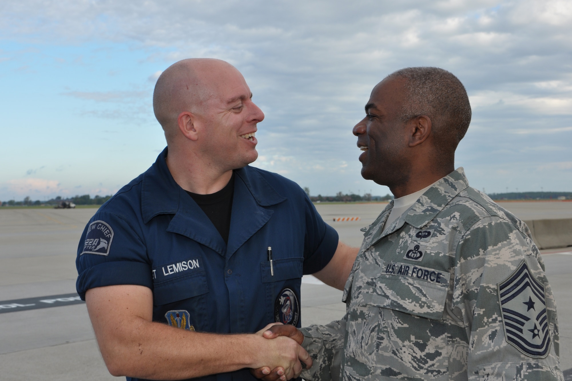 Chief Master Sgt. Gary Carter, 1st Fighter Wing command chief, spends some time getting to know Staff Sgt. James Lemison, 94th Aircraft Maintenance Unit dedicated crew chief, on the flightline at Langley Air Force Base, Va., Oct. 14, 2011. Carter said he had a lot of good mentors early in his career on the flightline who helped him get where he is today, (U.S. Air Force photo by Tech. Sgt. Randy Redman/Released)