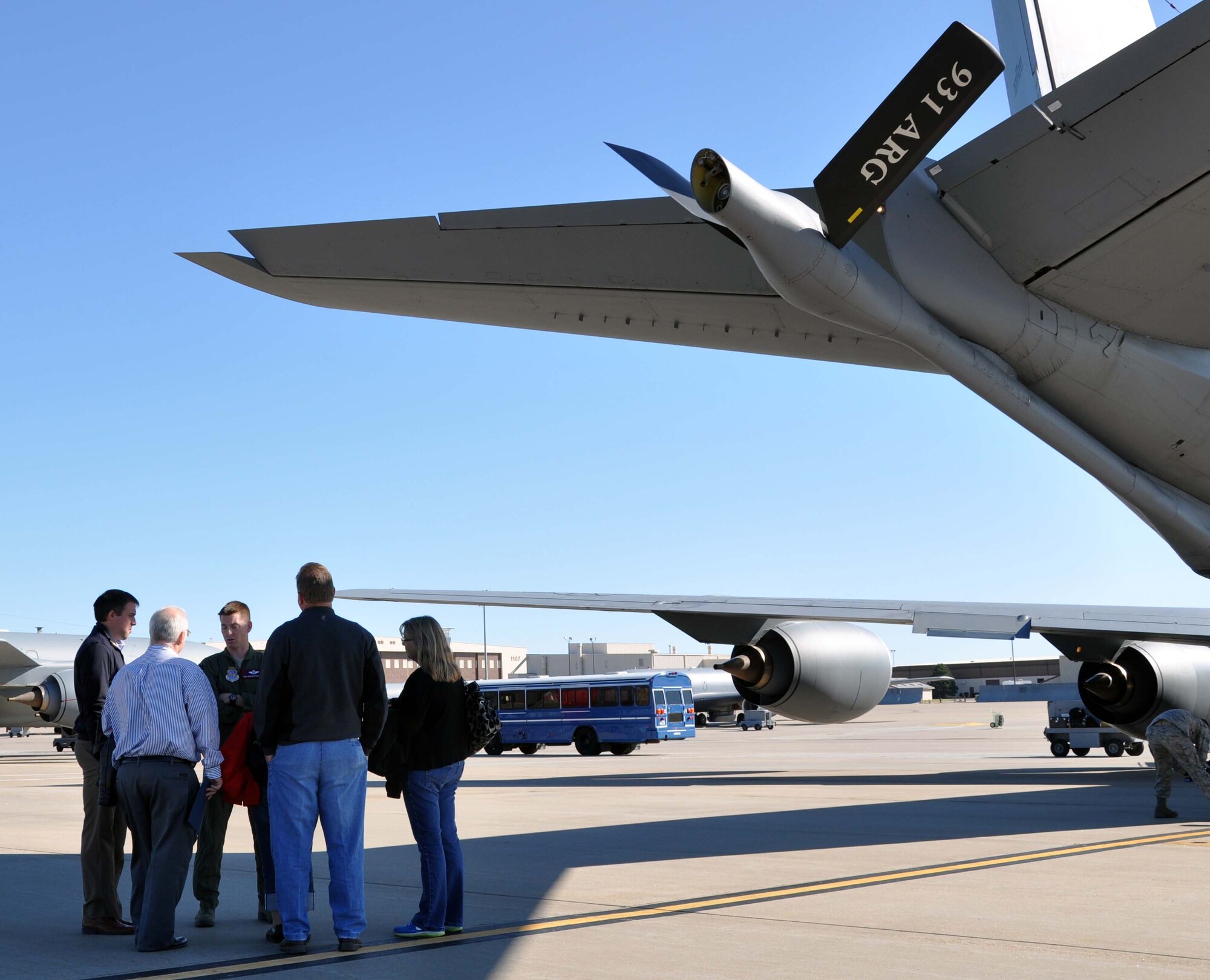 A group of McConnell Air Force Base honorary commanders receive a briefing on the capabilities of the KC-135 Stratotanker prior to an orientation flight at McConnell Air Force Base, Kan., Oct. 13, 2011.  Twenty-one honorary commanders took part in the flight, which familiarized them with the mission of the 931st Air Refueling Group and the 22nd Air Refueling Wing. (U.S. Air Force photo by 1st Lt. Zach Anderson)