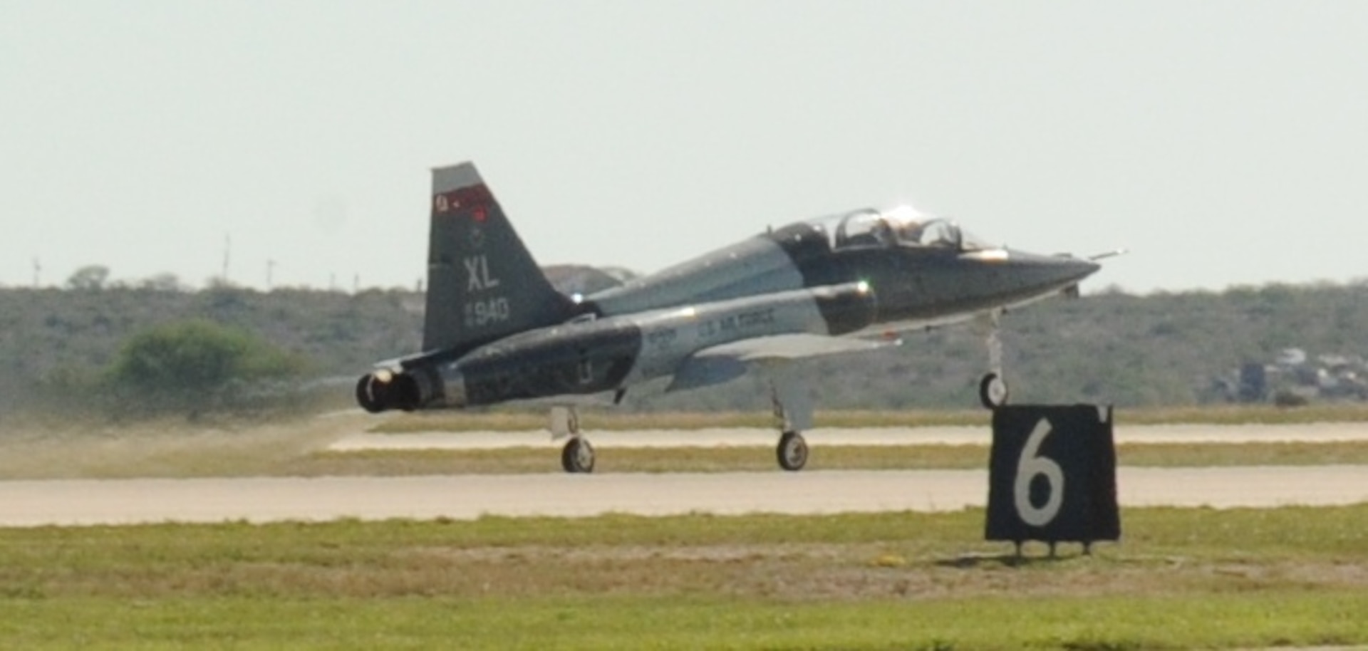 A 434th Fighter Training Squadron T-38C Talon jet bound for Randolph Air Force Base, Texas takes off from Laughlin Air Force Base, Texas, Oct. 4.  The jet is one of two of the first jets to be transferred to the 435th Fighter Training Squadron at Randolph as part of the consolidation of the Introduction to Figher Fundamentals training course.  Due to the consolidation, the 435th FTS will receive a total of 20 T-38Cs, 11 active duty instructor pilots, more than 30 support positions, and 80 additional students annually.  (U.S. Air Force Photo by Senior Airman Blake Mize)