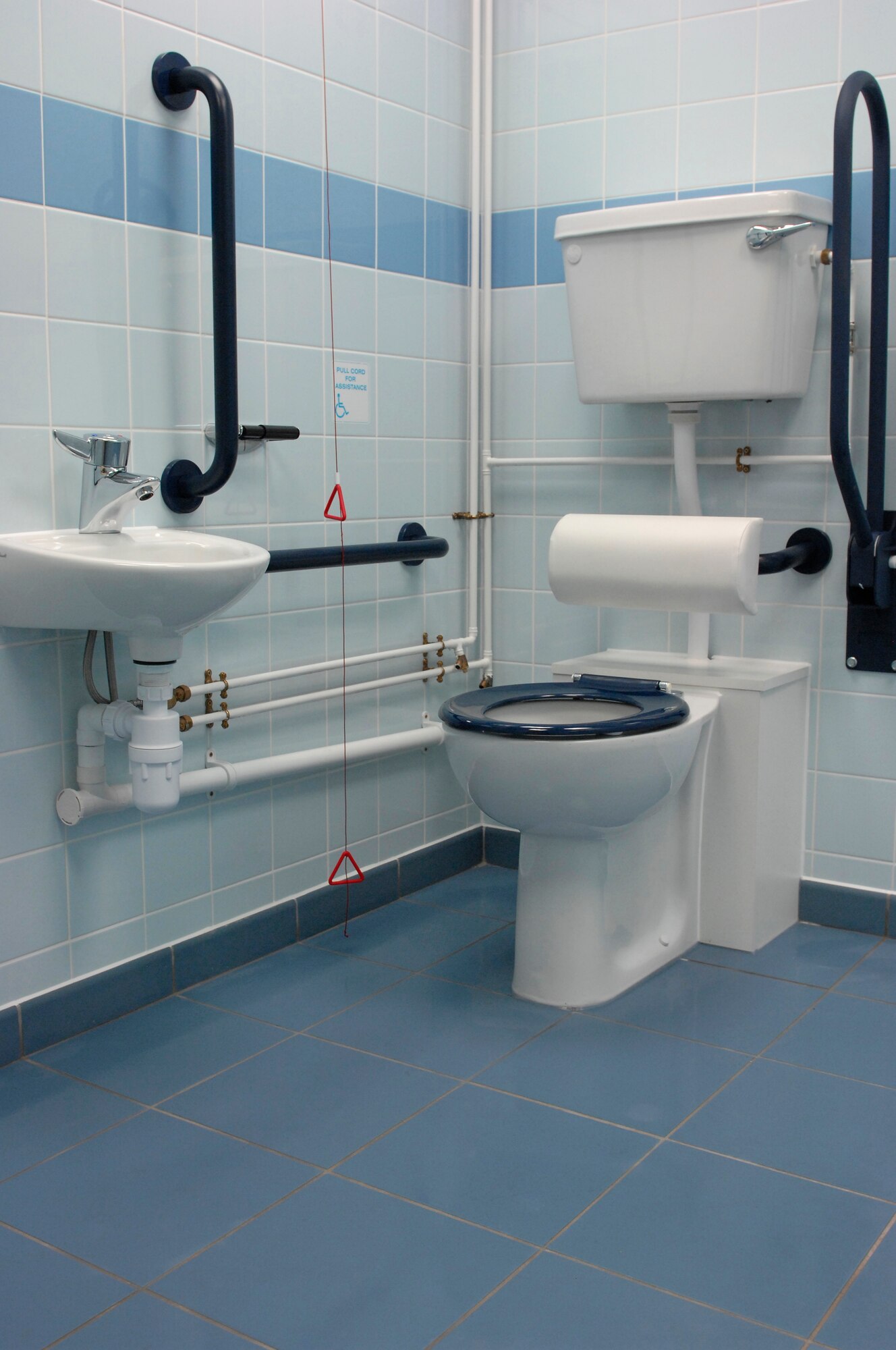 ROYAL AIR FORCE LAKENHEATH, England--The Knight's Table Dining Facility reopens Oct. 14 following a five-month renovation. One new addition to the facility is a handicap-accessible restroom.  The primary goal of the renovation was to bring the facility in line with current safety requirements to include a new fire suppression system, alarms, new lighting and non-slip flooring in the kitchen.  (U.S. Air Force photo by Tech. Sgt. Lee A. Osberry Jr.)