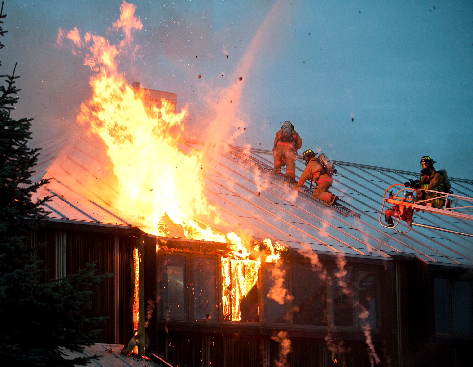 Joint Base Elmendorf-Richardson firefighters battle a fire at building 9386 on JBER October 13, 2011. All occupants of the lodging facility were accounted for and no injuries were reported. (U.S. Air Force photo/Staff Sgt. Zachary Wolf)(Released)