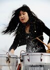 A Korean female drummer entertains the crowd at the 2011 Gunsan-Saemangeum Airshow in Gunsan City, Republic of Korea, Oct. 9, 2011. The City of Gunsan, the 8th Fighter Wing and the Republic of Korea Air Force’s 38th Fighter Group hosted the air show. There were about 170,000 civilians and military attendees over the two-day period that came out for the air show. (U.S. Army photo by Spc. Christopher Wellner/Released)