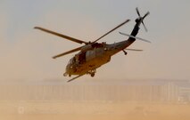 An HH-60 Pavehawk performs maneuvers during an aerial demonstration and combat search and rescue exercise at the 2011 Gunsan-Saemangeum Airshow in Gunsan City, Republic of Korea, Oct. 9, 2011. The City of Gunsan, the 8th Fighter Wing and the Republic of Korea Air Force’s 38th Fighter Group hosted the air show. There were about 170,000 civilians and military attendees over the two-day period that came out for the air show. (U.S. Army photo by Spc. Christopher Wellner/Released)
