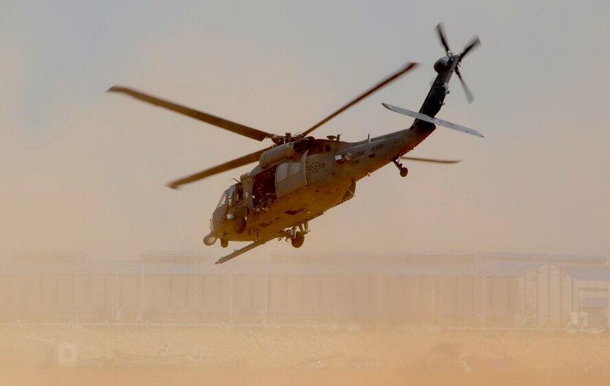 An HH-60 Pavehawk performs maneuvers during an aerial demonstration and combat search and rescue exercise at the 2011 Gunsan-Saemangeum Airshow in Gunsan City, Republic of Korea, Oct. 9, 2011. The City of Gunsan, the 8th Fighter Wing and the Republic of Korea Air Force’s 38th Fighter Group hosted the air show. There were about 170,000 civilians and military attendees over the two-day period that came out for the air show. (U.S. Army photo by Spc. Christopher Wellner/Released)
