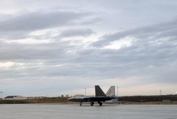 Lt. Col. David Piffarerio, 302nd Fighter Squadron commander, taxis an F-22 during the 477th Fighter Group’s drill weekend. This is the first weekend that the Reserves have conducted F-22 flight operations following a four month stand-down.  (U.S. Air Force Photo/Capt. Ashley Conner) 