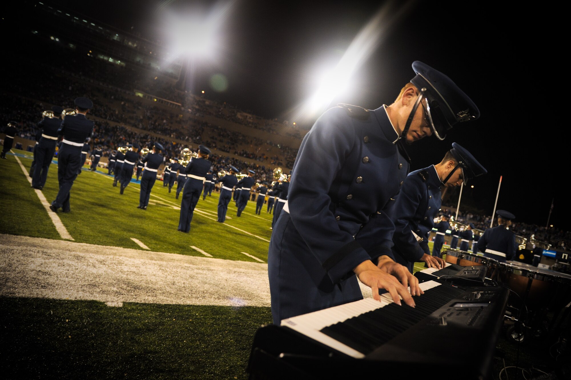 Members of the U.S. Air Force Academy band play during a half time show at Falcon Stadium in Colorado Springs, Co., Oct. 13. The band performed a number of songs, including Proud Mary and the theme from the movie Indiana Jones. (U.S. Air Force Photo/Senior Airman Lauren Main)
 
