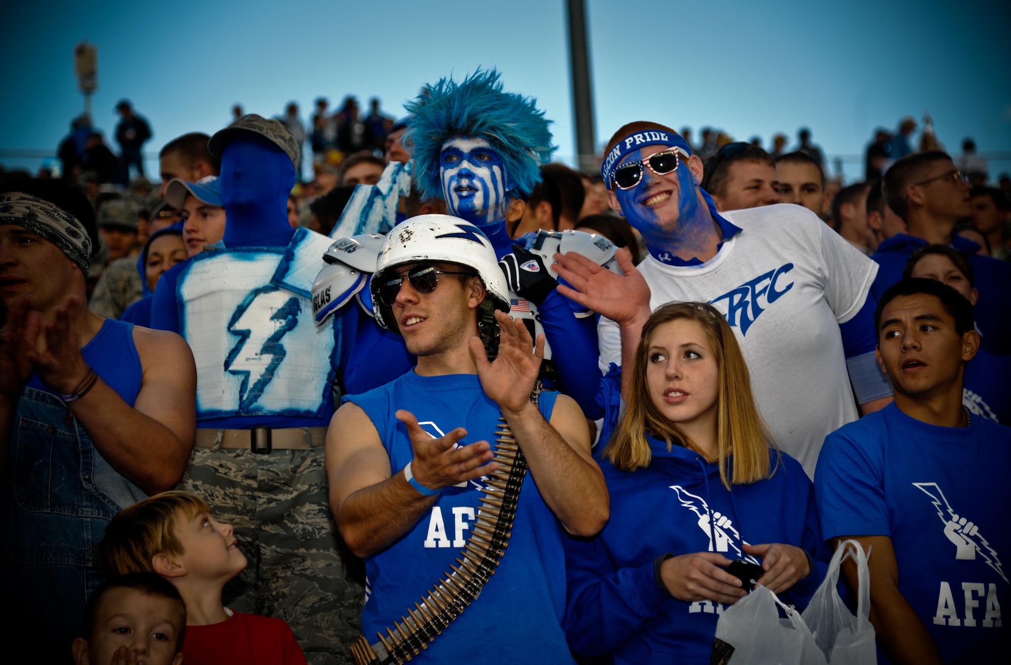 Spritied U.S. Air Force Academy cadets and fans cheer on the Falcons at Falcon Stadium in Colorado Springs, Co., Oct. 13. The cadets were a few of many who proudly and elaborately showed their support for the Academy team. (U.S. Air Force Photo/Senior Airman Lauren Main)
