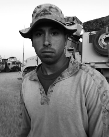 Sgt. Thomas Bolander is a security team leader with Combat Logistics Company, Combat Logistics Battalion 6 - an element of 2nd Marine Logistics Group (Forward). The Toledo, Ohio, native currently serves in Afghanistan along with three other Marine Corps reservists from Military Police Company Charlie, based in Dayton, Ohio. The four also deployed to Iraq together in 2009. (U.S. Marine Corps photo by Sgt. Justin J. Shemanski)
