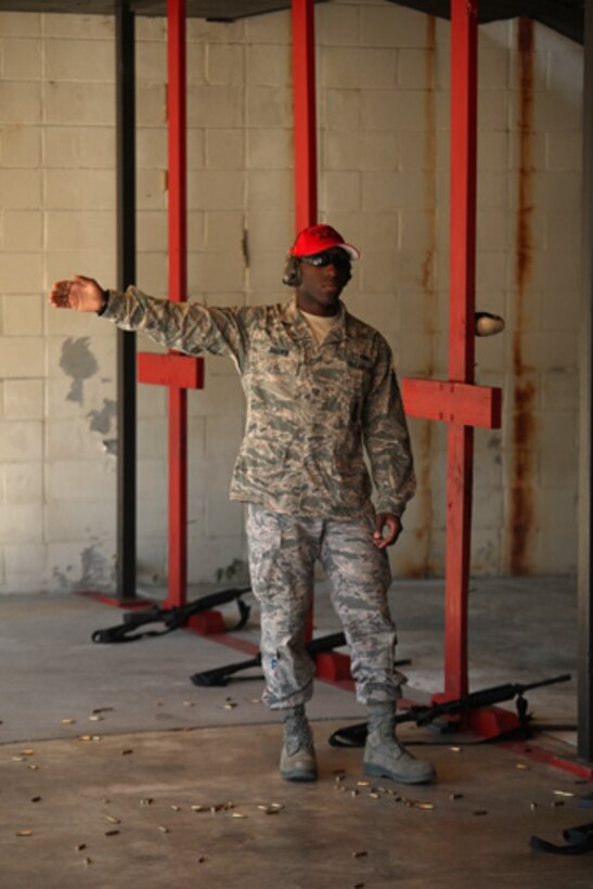 Members assigned to the 315th Security Forces Squadron who conduct Combat Arms Training and Maintenance, provide instruction and guidance during CATM qualification with Airmen assigned to the 560th Red Horse Squadron October 15, 2011 at Joint Base Charleston, S.C. (U.S. Air Force photo by Staff Sgt. Rashard Coaxum)