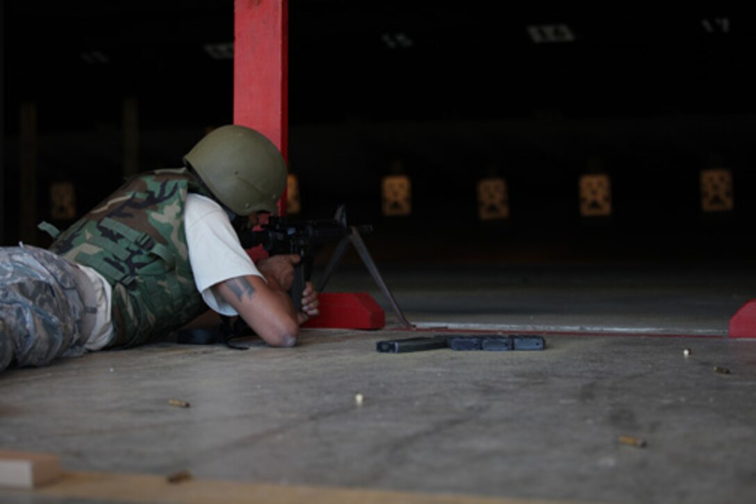 Members assigned to the 315th Security Forces Squadron who conduct Combat Arms Training and Maintenance, provide instruction and guidance during CATM qualification with Airmen assigned to the 560th Red Horse Squadron October 15, 2011 at Joint Base Charleston, S.C. (U.S. Air Force photo by Staff Sgt. Rashard Coaxum)