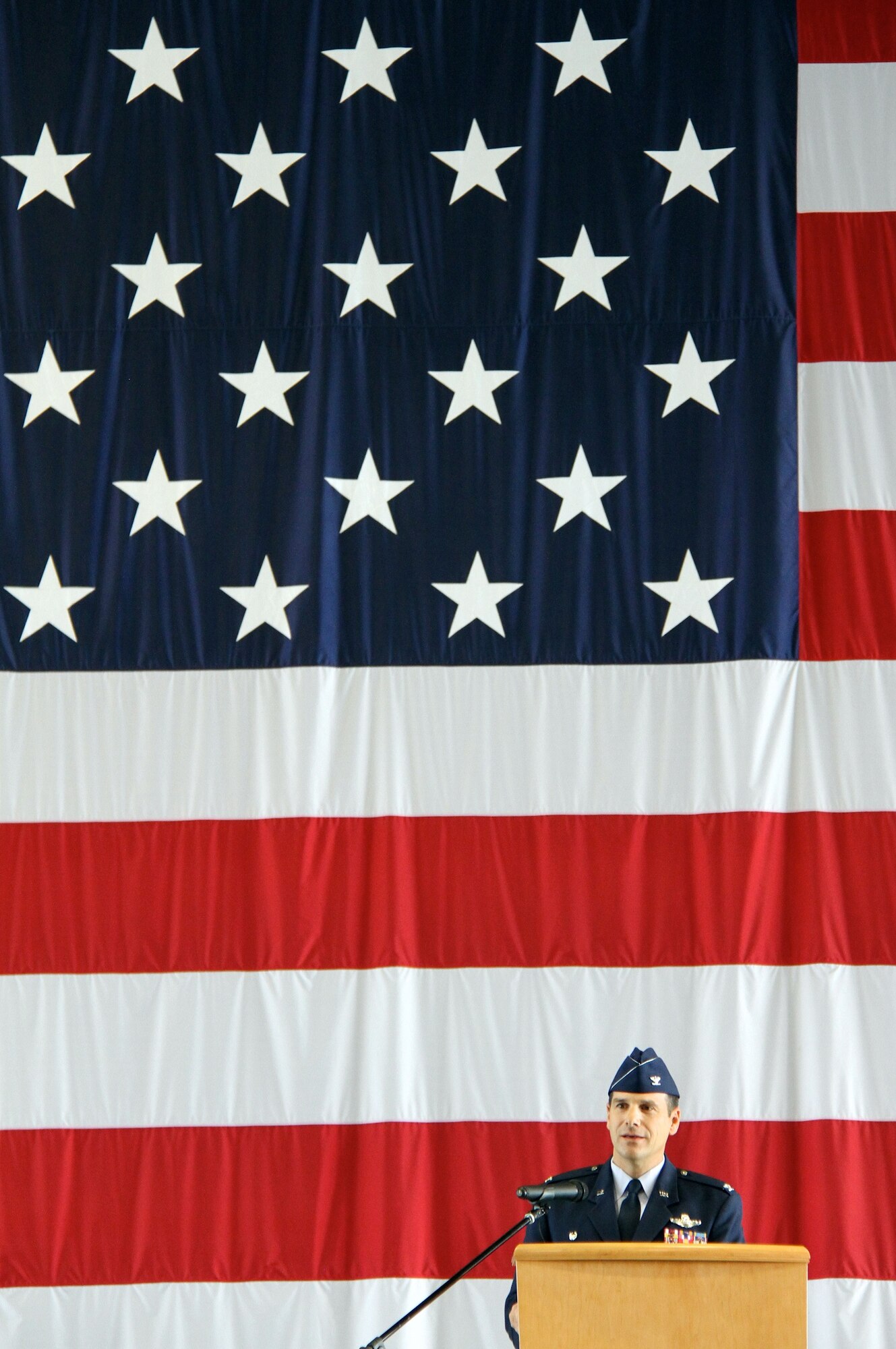 Col. Albert V. Lupenski speaks to 932nd Airlift Wing members during change of command ceremonies held Oct. 16, in Hangar One at Scott Air Force Base, Ill.   The 932nd AW is an Air Force Reserve flying unit  whose mission is to provide safe, first-class airlift for distinguished visitors and their staffs. (U.S. Air Force photo/ Tech. Sgt. Christopher Parr)