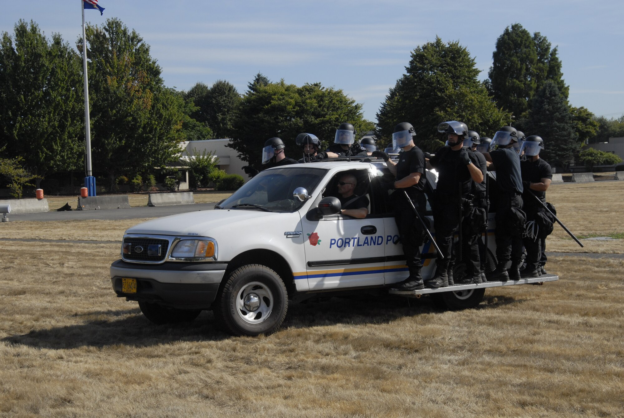 Members from the Portland Police Bureau’s Rapid Response Team train with the 142nd Security Forces Squadron in crowd control procedures and techniques.  The RRT and SF teams practiced movement techniques, deployment and crowd control tactics in preparation for the upcoming election year.  (U.S. Air Force Photograph by 1st Lt. Adrian Remington, 142nd Fighter Wing Public Affairs)