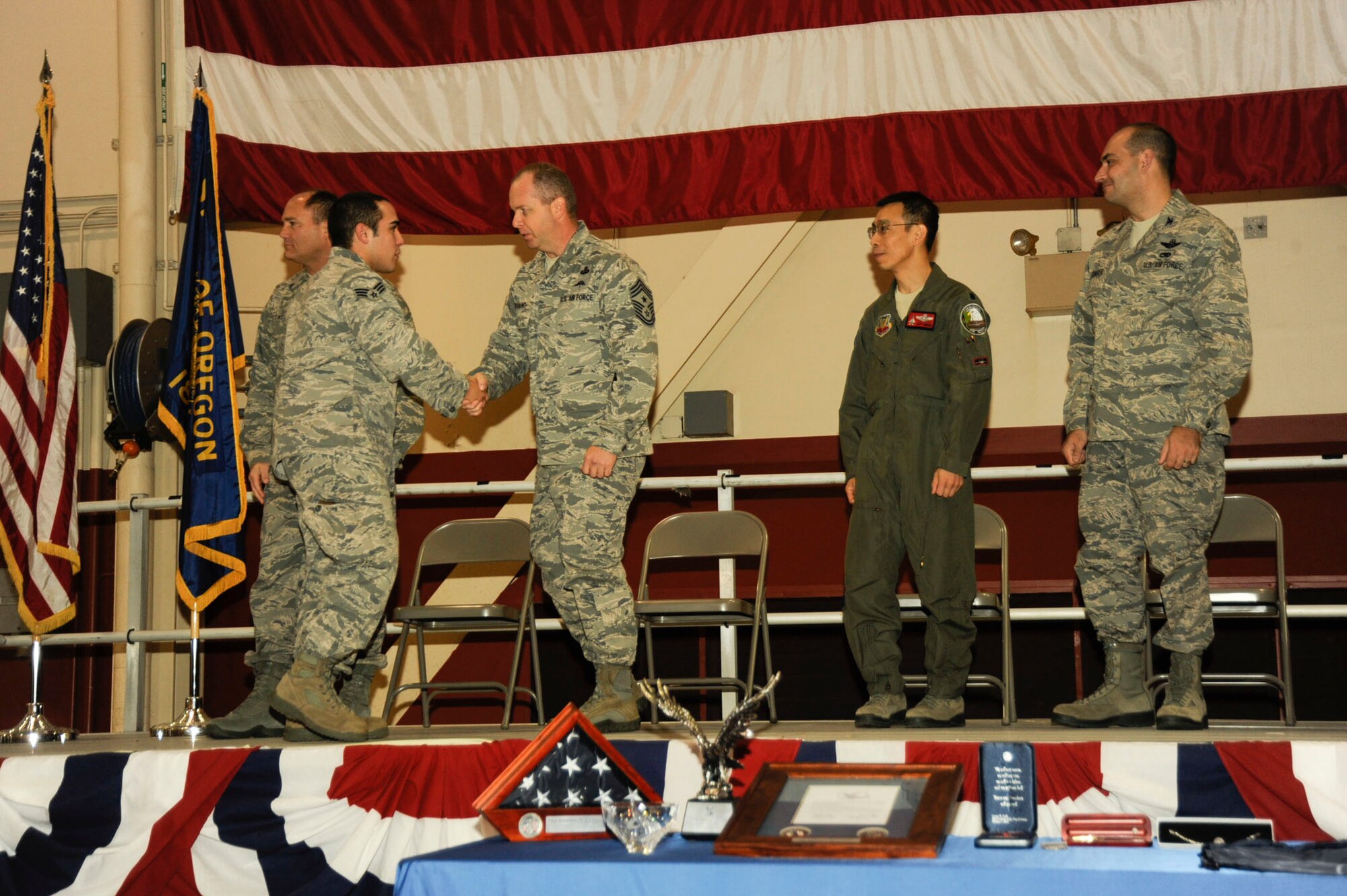 Portland Air National Guard Base, Portland, Ore.— Over 60 airmen of the Oregon Air National Guard were honored during a “Hometown Heroes” ceremony here October 15, 2011 to celebrate a safe return home from various military deployments throughout the world in support of global contingency operations. (US Air Force Photograph by Staff Sgt. Aaron Perkins, 142nd Fighter Wing Public Affairs)