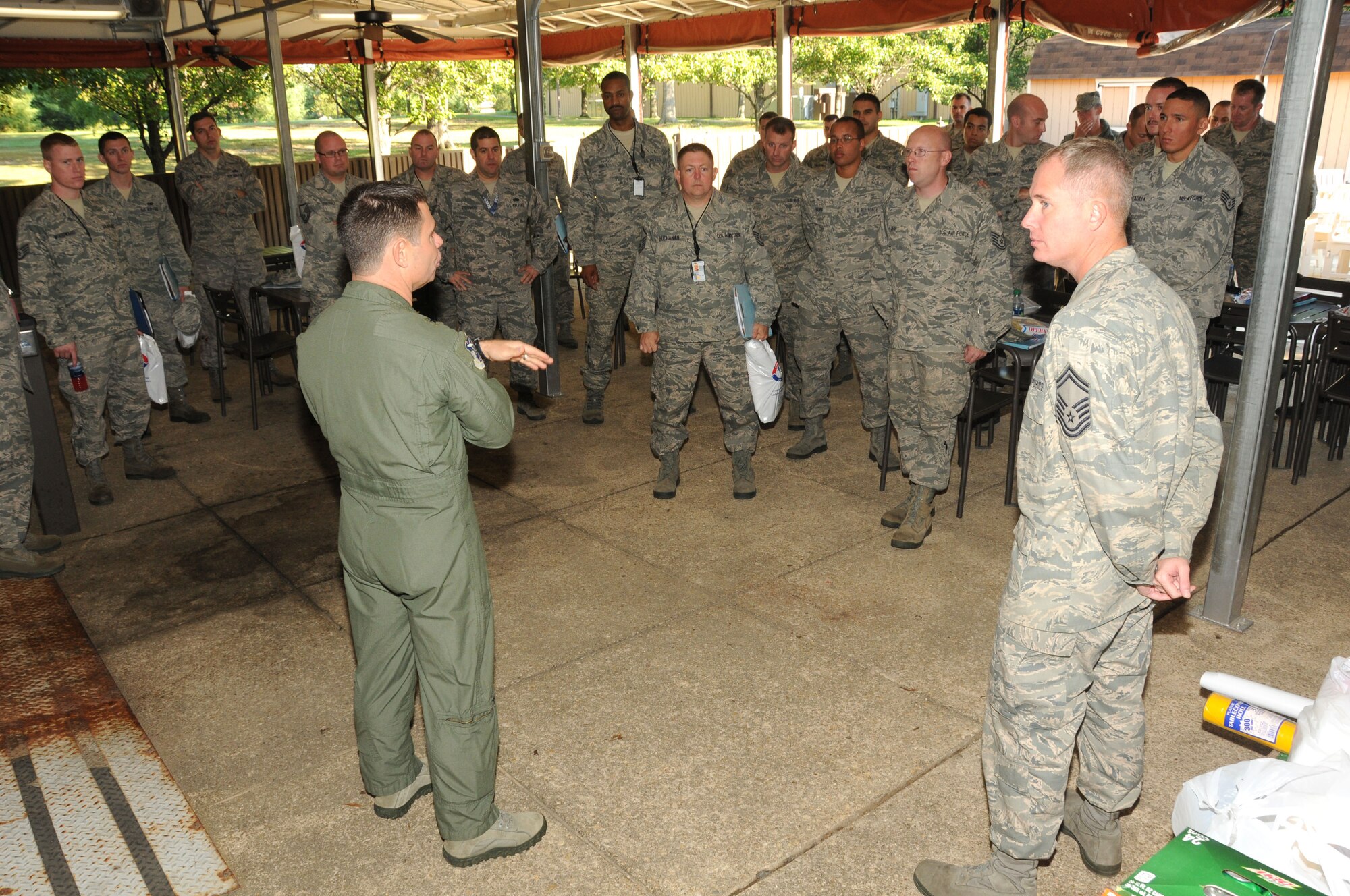 Brig. Gen. Jeff Johnson, 113th Wing Commander, D.C. Air National Guard, speaks to the troops during deployment outprocessing on Joint Base Andrews, Oct. 7.  More than 175 113 WG members departed on the Air Expeditionary Force deployment.    (U.S. Air Force photo/Tech Sgt. Craig Clapper)