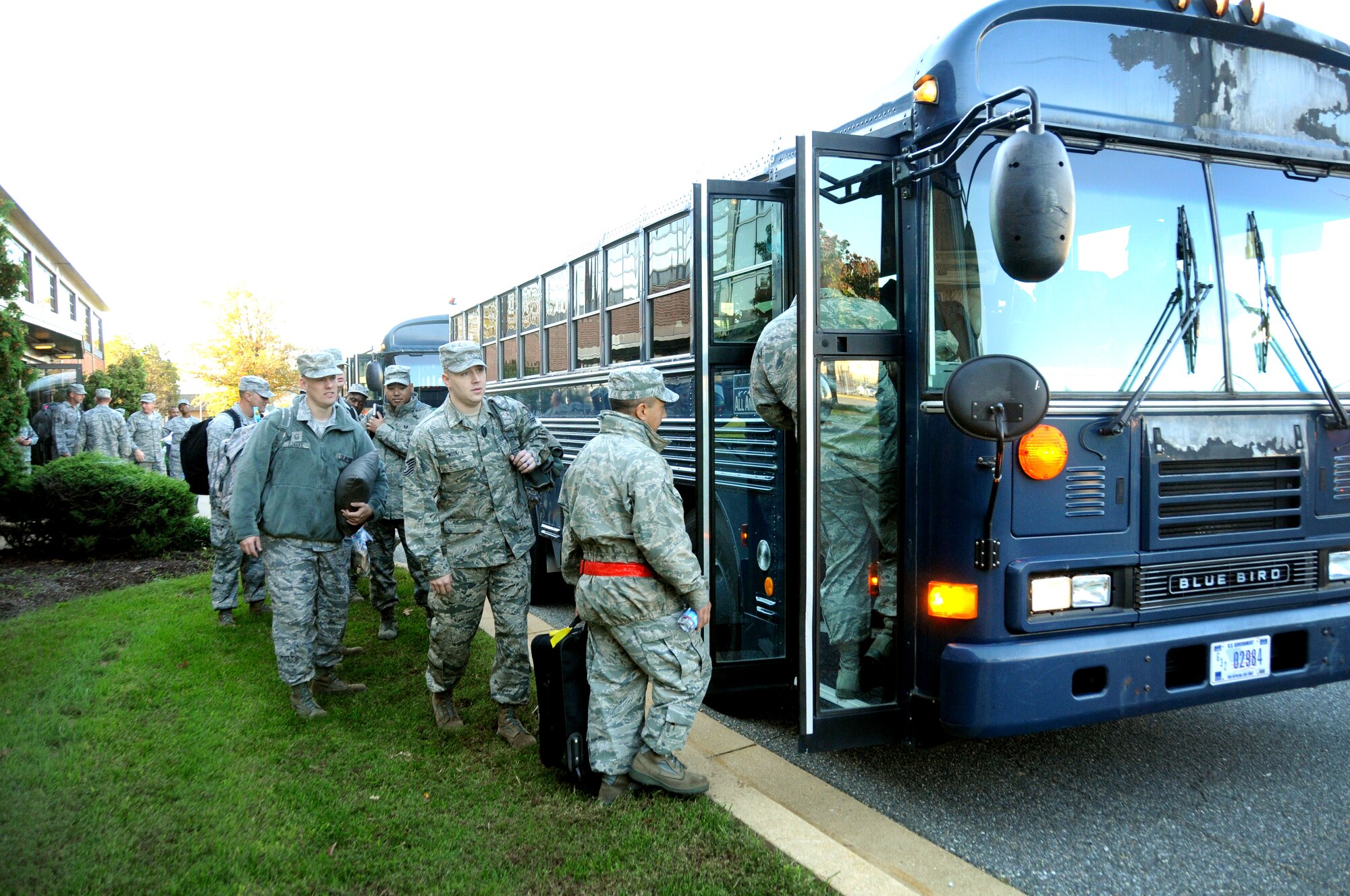 113th Wing, D.C. Air National Guard, members board a bus headed to the passenger air terminal on Joint Base Andrews, Md., as the members prepare to deploy to an overseas location.  More than 175 113 WG members departed on the Air Expeditionary Force deployment.    (U.S. Air Force photo/Tech Sgt. Craig Clapper)  