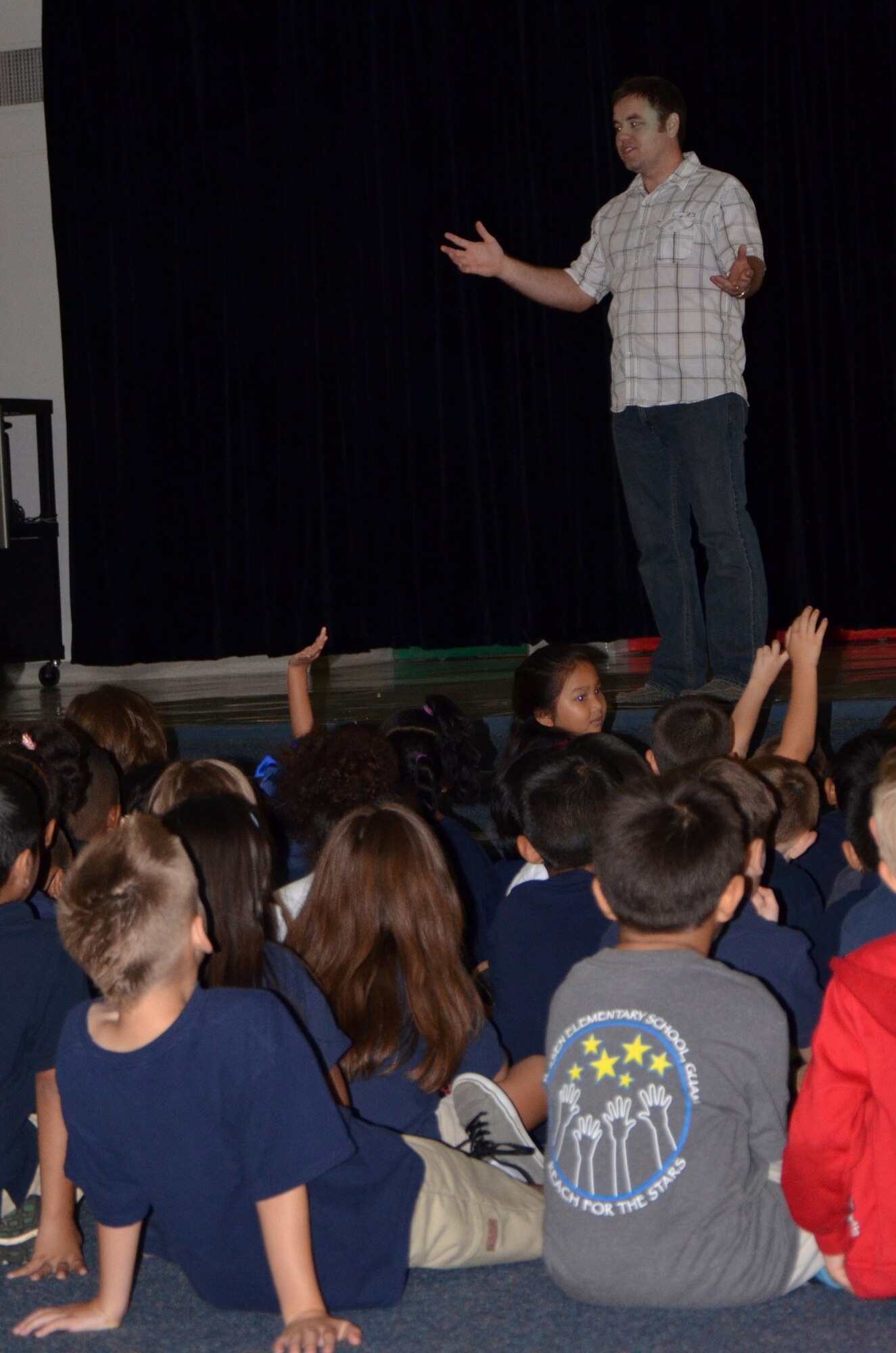 Patrick Russell, 36th Civil Engineer Squadron energy manager, briefs Andersen Elementary School first grade students on the importance of energy awareness here Oct. 14.  The visit was part of an Energy Awareness Month initiative to educate the children in an interactive manner about how they can help save energy.  (U.S. Air Force photo/Senior Airman Veronica McMahon)