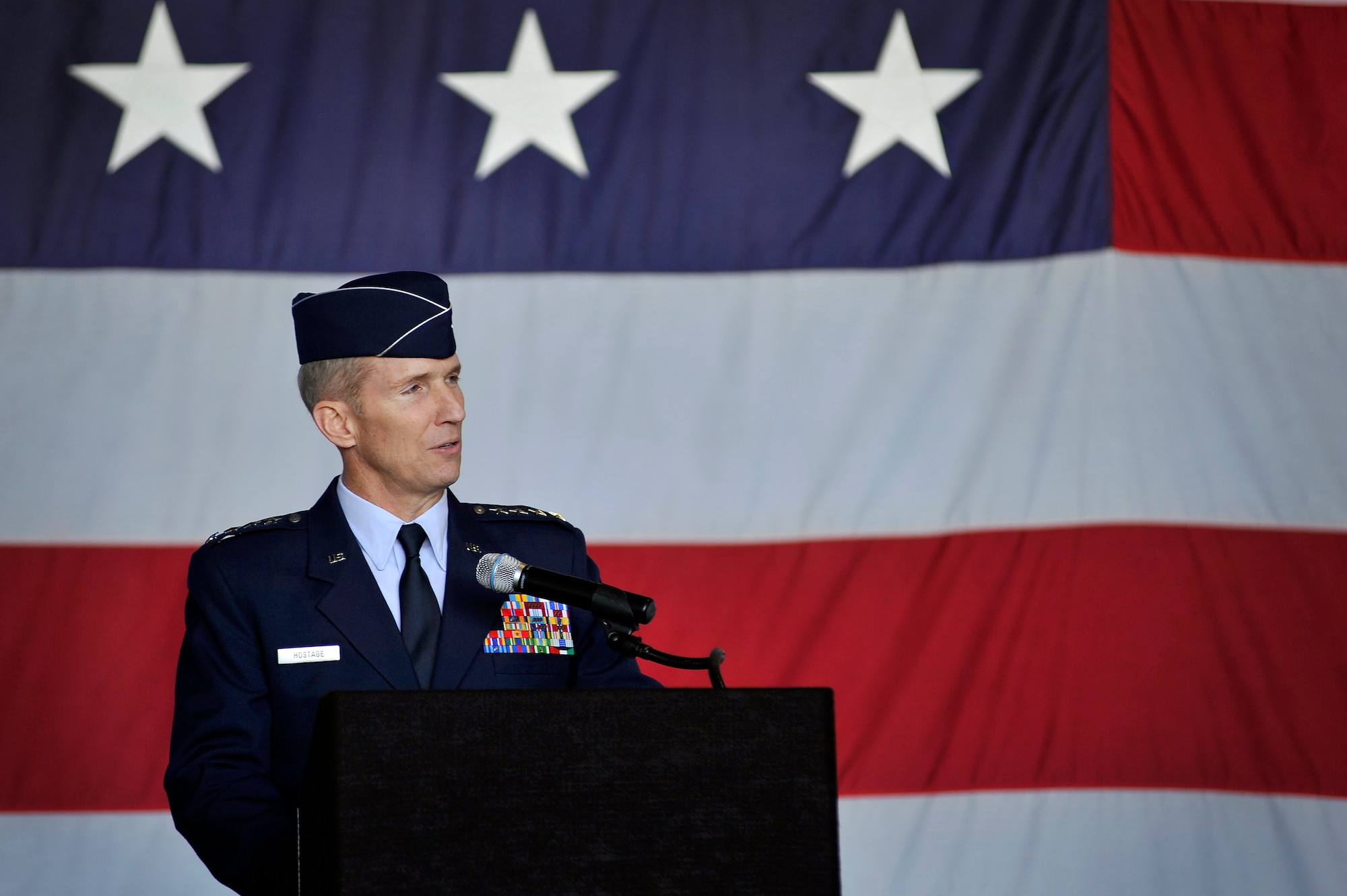 U.S. Air Force Gen.  Mike Hostage, commander of Air Combat Command, speaks as the presiding officer during the 9th Air Force change of command at Shaw Air Force Base, S.C., Oct 17.  During the change of command Maj. Gen. Stephen Hoog relinquished command to Maj. Gen. Lawrence Wells. The 9th Air Force is comprised of seven wings and two direct reporting units in the eastern United States with more than 350 aircraft, and 24,000 active duty and civilian personnel. (U.S. Air Force photo by Senior Airman Kenny Holston/Released)



