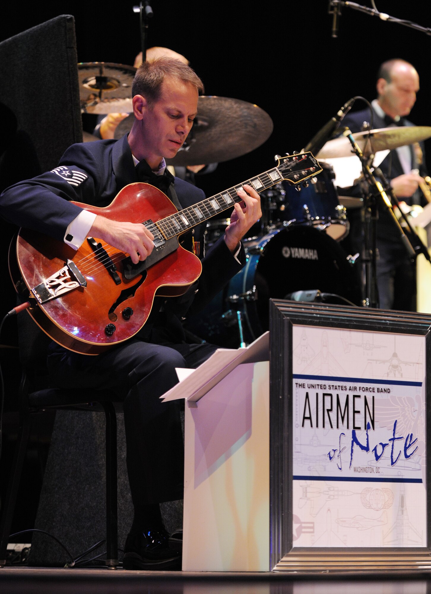 Tech. Sgt. Geoff Reecer, U.S. Air Force Airmen of Note guitarist, jams on some chords during the 2011 Jazz Heritage Series, Oct. 15. Two more performances by the Airmen of Note are Nov. 4 and Nov. 18. All of the concerts are free; no tickets are needed. The concerts are at Lisner Auditorium, The George Washington University, 730 21st Street N.W., Washington, D.C. beginning at 8 p.m. (U.S. Air Force photo by Staff Sgt. Christopher Ruano)