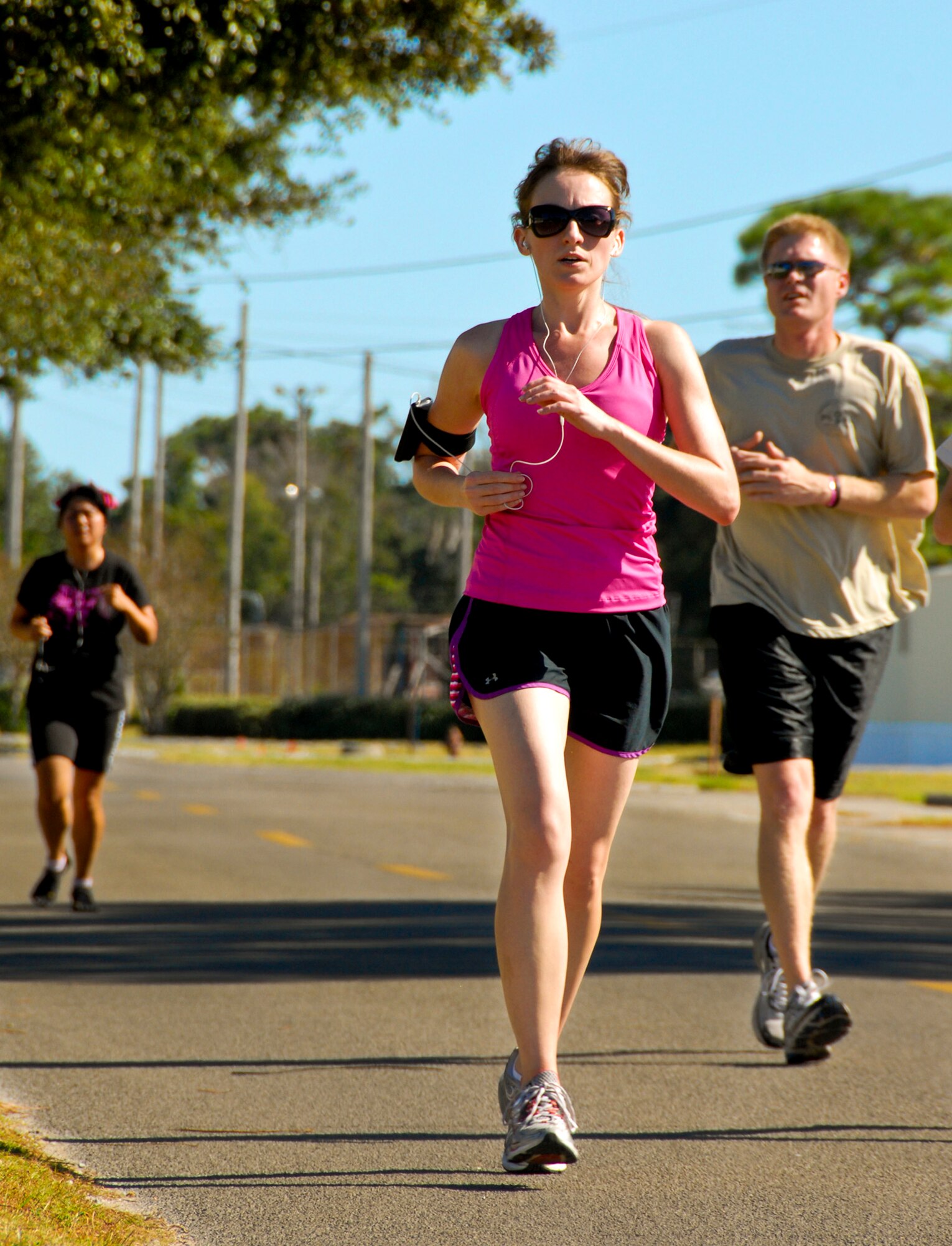 Runners participate in the Breast Cancer 5K run/walk at Eglin Air Force Base Fla., Oct. 14. The event helps to raise awareness of the importance for women to self-test and catch the disease in its early stages. More than 100 people attended the event. (U.S. Air Force photo/Sachel Seabrook)