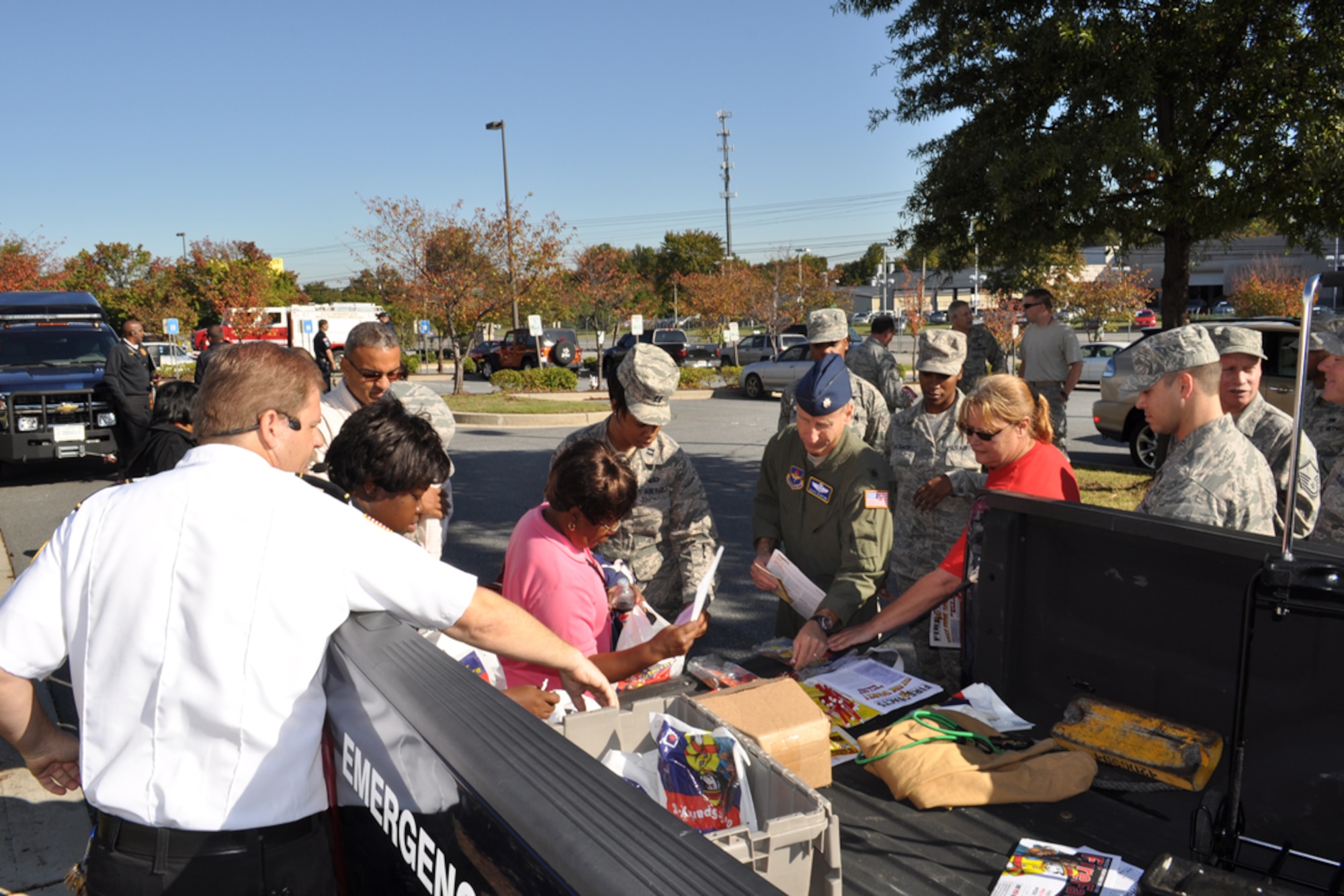 Mark A. Berkenmeier, Dobbins fire inspector, hands out fire safety literature to members of the 94th Airlift Wing during Fire Prevention Week Oct. 14. National Fire Prevention Week 2011 was observed Oct. 9-15. “This year’s theme is Protect Your Family from Fire,” said Berkenmeier. “The campaign is all about keeping ourselves, our families, and our communities safer from fire.” Safety tips to reduce home fires include staying in the kitchen when cooking, having heating equipment and chimneys inspected and cleaned annually, if you smoke, smoke outside, keeping flammable materials away from light bulbs, light fixtures and lamps and when burning candles indoors, blow them out before leaving the room. (U.S. Air Force photo/Danielle Purnell)
