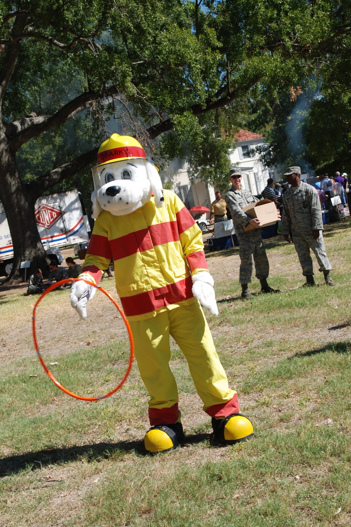 Sparky, the firefighters’ mascot entertains the crowd with his skills during the Celebrate Barksdale activities at Barksdale Air Force Base, La., Oct. 14, 2011. The event was sponsored by the Military Affairs Council at Barksdale and was open to all those with access to the base. (U.S. Air Force photo by Betty Stephens)
