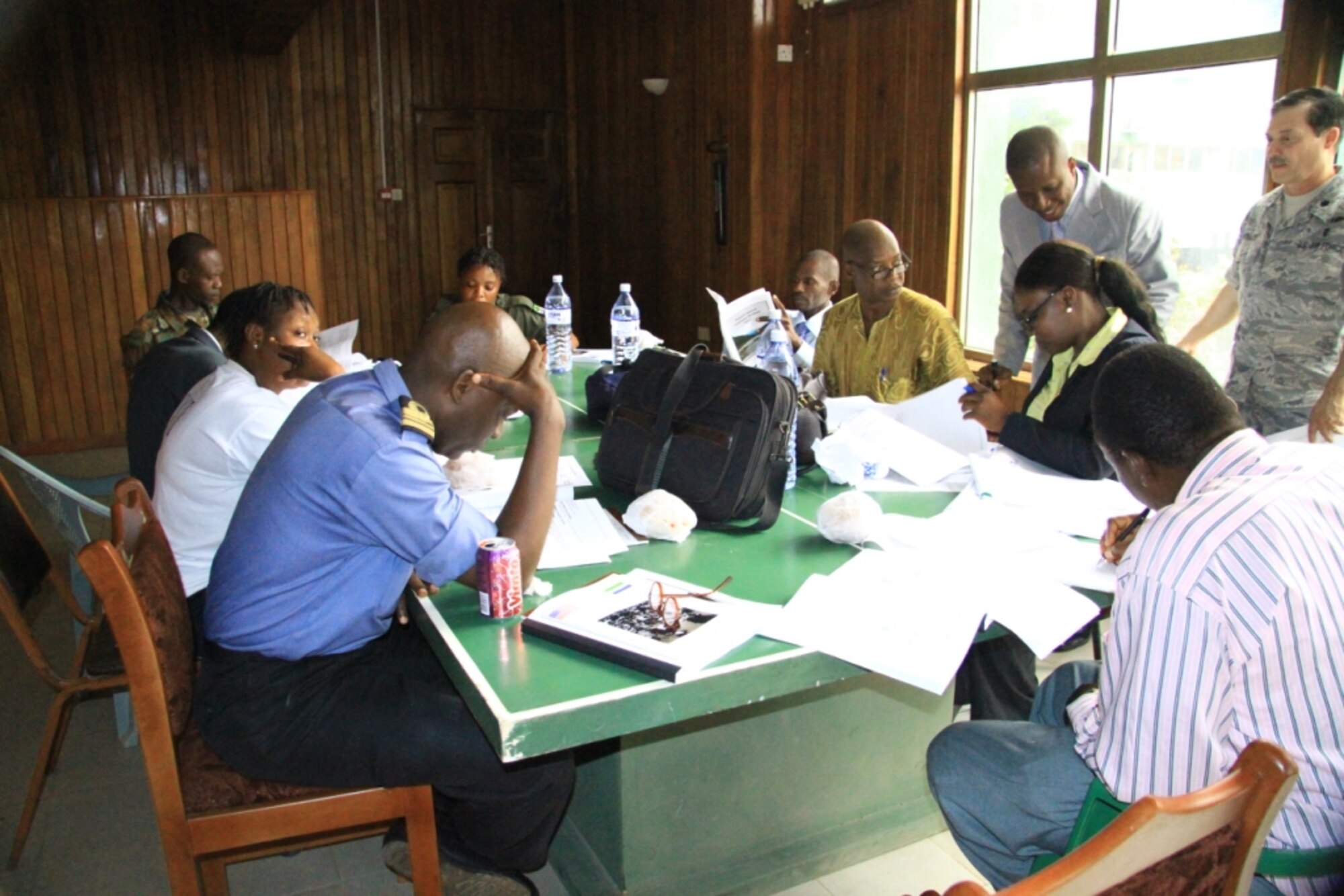 Lt Col Luis Morales, Disaster Planning Course Director, facilitating a group exercise in Freetown, Sierra Leone.  Included in the picture is the Director of Disaster Management from the Sierra Leone Office of National Security, members of the Sierra Leone Armed Forces and the Gumma Valley Water Authority.  (Photo by retired Air Force Maj.Melissa Schlechte).