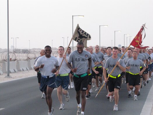 Lt. Col. Terrence Adams (front left), 379th Communications Squadron commander, challenged his squadron to perform 1 million pushups and sit-ups in the month of September.  His squadron exceeded the challenge by more than 15,000 repetitions.  (Courtesy photo)