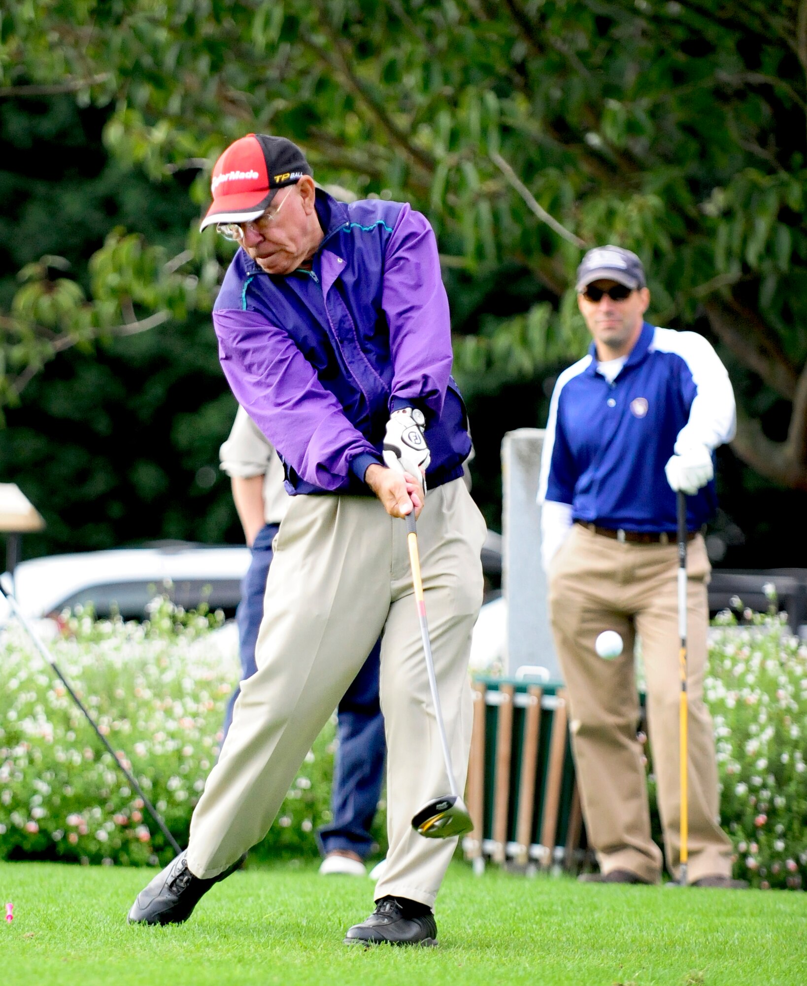 RAF LAKENHEATH, England – Ken Thompson, British-American Committee member, drives off the first tee box during the inaugural British-American Committee ‘Challenge Cup’ at the Breckland Pines Golf Club, RAF Lakenheath, Oct. 14, 2011. Thompson, who helped organize the event, plays with a 15 handicap and said the day was about fostering Anglo-American relations. (U.S. Air Force photo/Senior Airman Ethan Morgan)