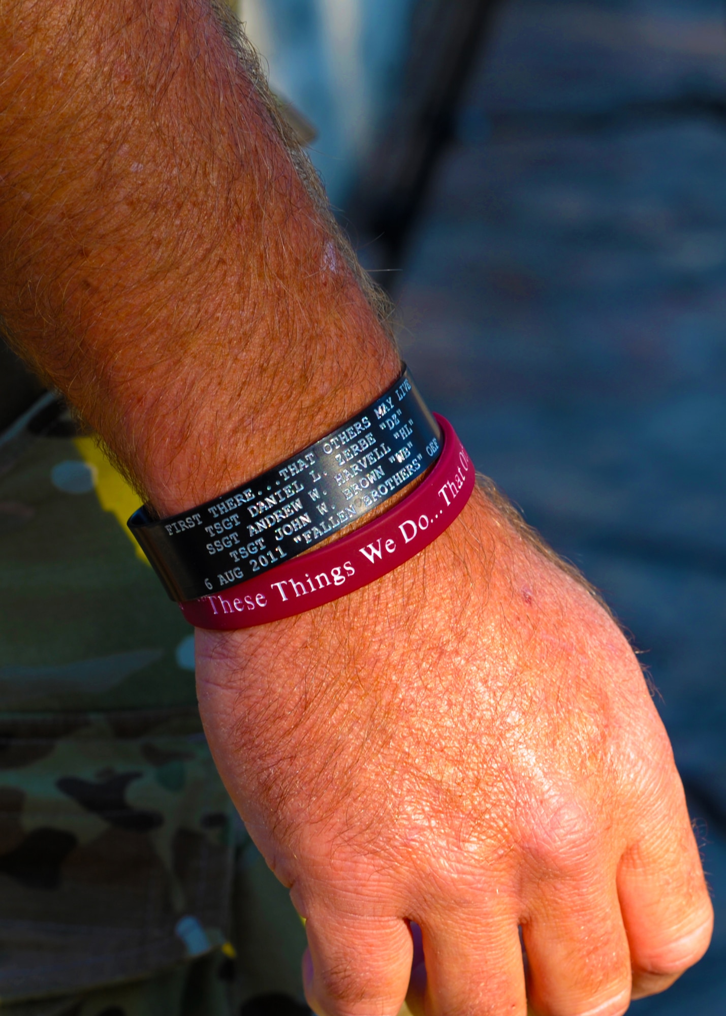 A bracelet displaying the names of the most recent fallen special tactics Airmen is worn during the Tim Davis Memorial March at Lackland Air Force Base, Texas, Oct. 16, 2011. . The 812-mile march honors fallen special tactics Airmen and will span across five states before ending at the Special Tactics Training Squadron at Hurlburt Field, Fla., Oct. 26, 2011. (U.S. Air Force photo by Staff Sgt. Sharida Jackson) 