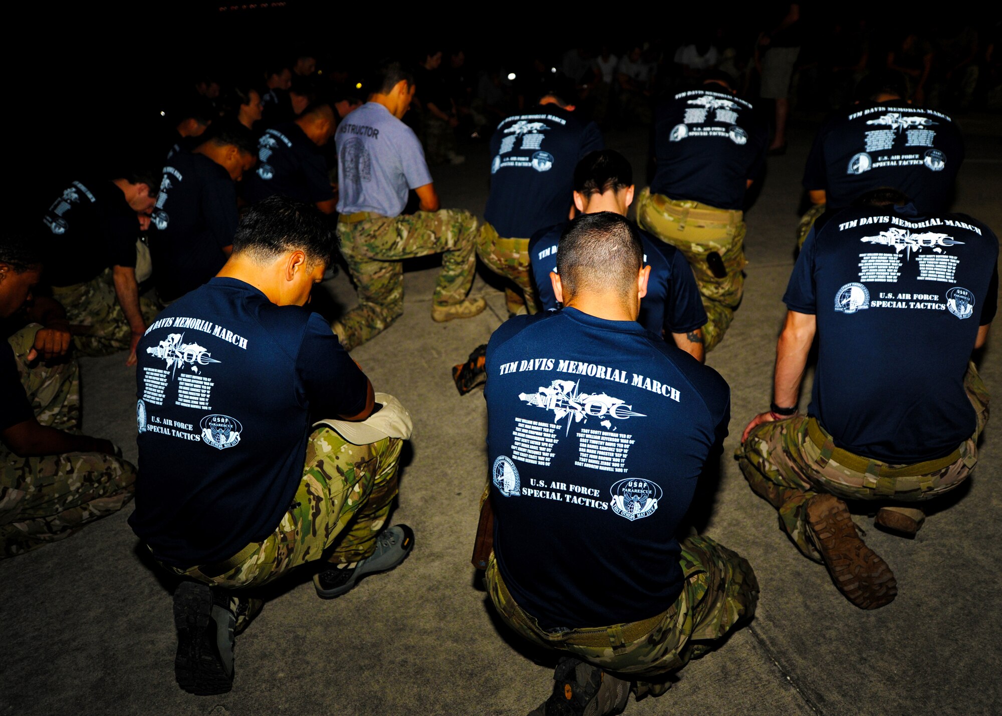 Special tactics Airmen say a prayer before starting the Tim Davis Memorial March at Lackland Air Force Base, Texas, Oct. 16, 2011. The 812-mile march honors fallen special tactics Airmen and will span across five states before ending at the Special Tactics Training Squadron at Hurlburt Field, Fla., Oct. 26, 2011. (U.S. Air Force photo by Staff Sgt. Sharida Jackson) 