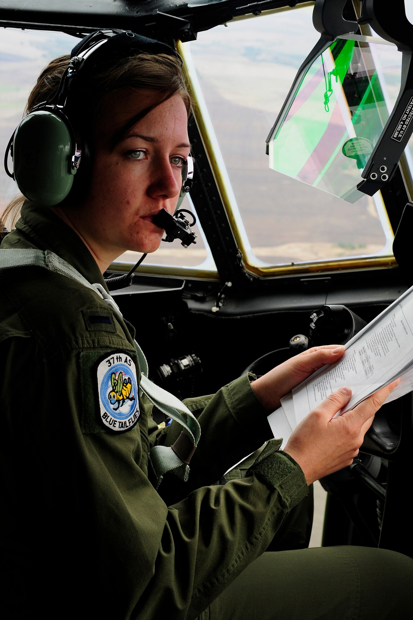 1st Lt. Caitlin Curran, a 37th Airlift Squadron pilot from Ramstein Air Base, Germany, reviews operating instructions during Exercise Thracian Fall 2011 in Plovdiv, Bulgaria, Oct. 17, 2011. Thracian Fall is an off-station training exercise designed to enhance interoperability between U.S. and Bulgarian Air Forces as well as build partnerships with paratroopers from both. (U.S. Air Force photo by Senior Airman Stephen J. Otero)